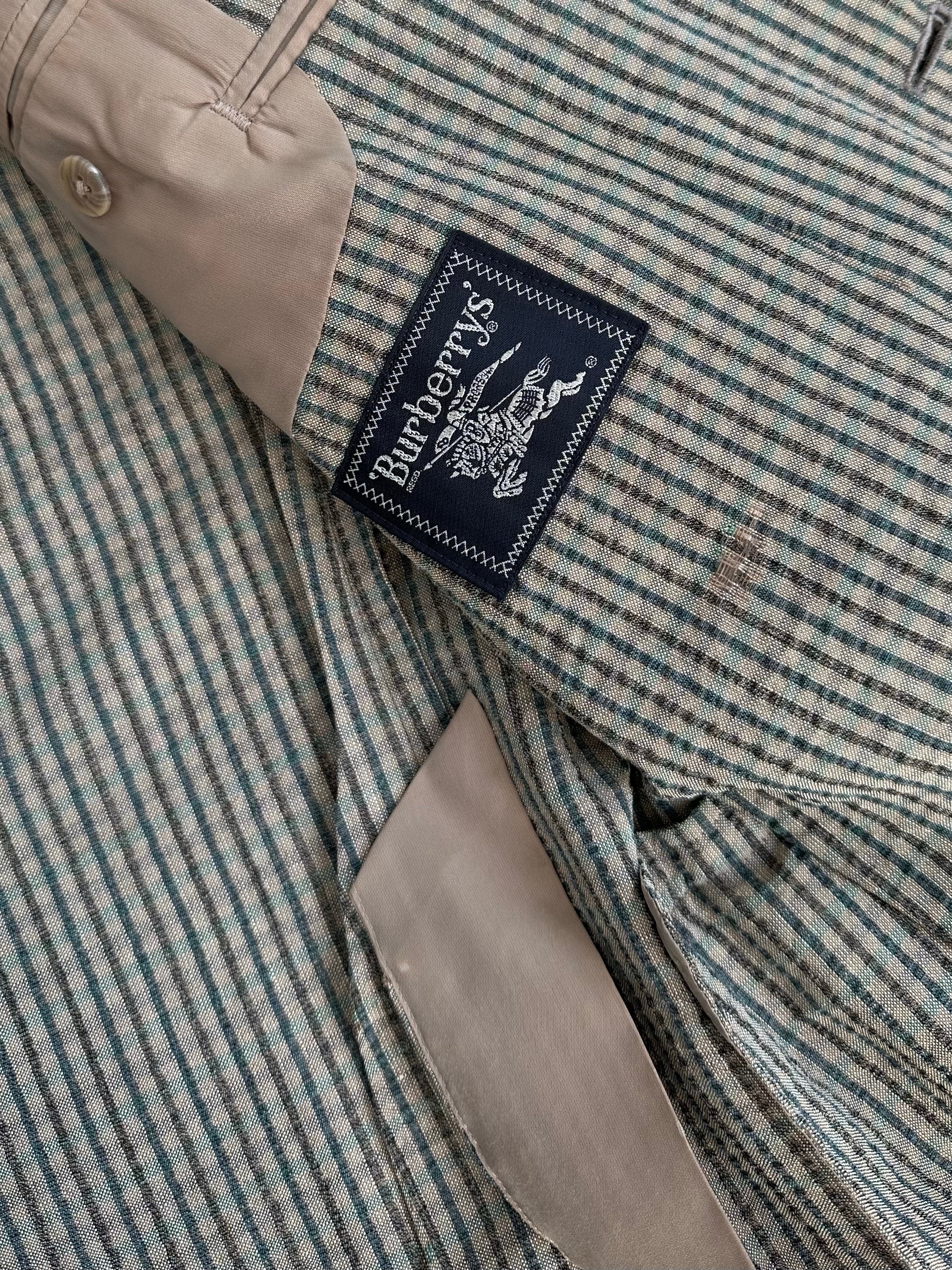 Burberry 1990s wool silk check unlined blazer in size S, featuring classic plaid pattern and tailored fit.