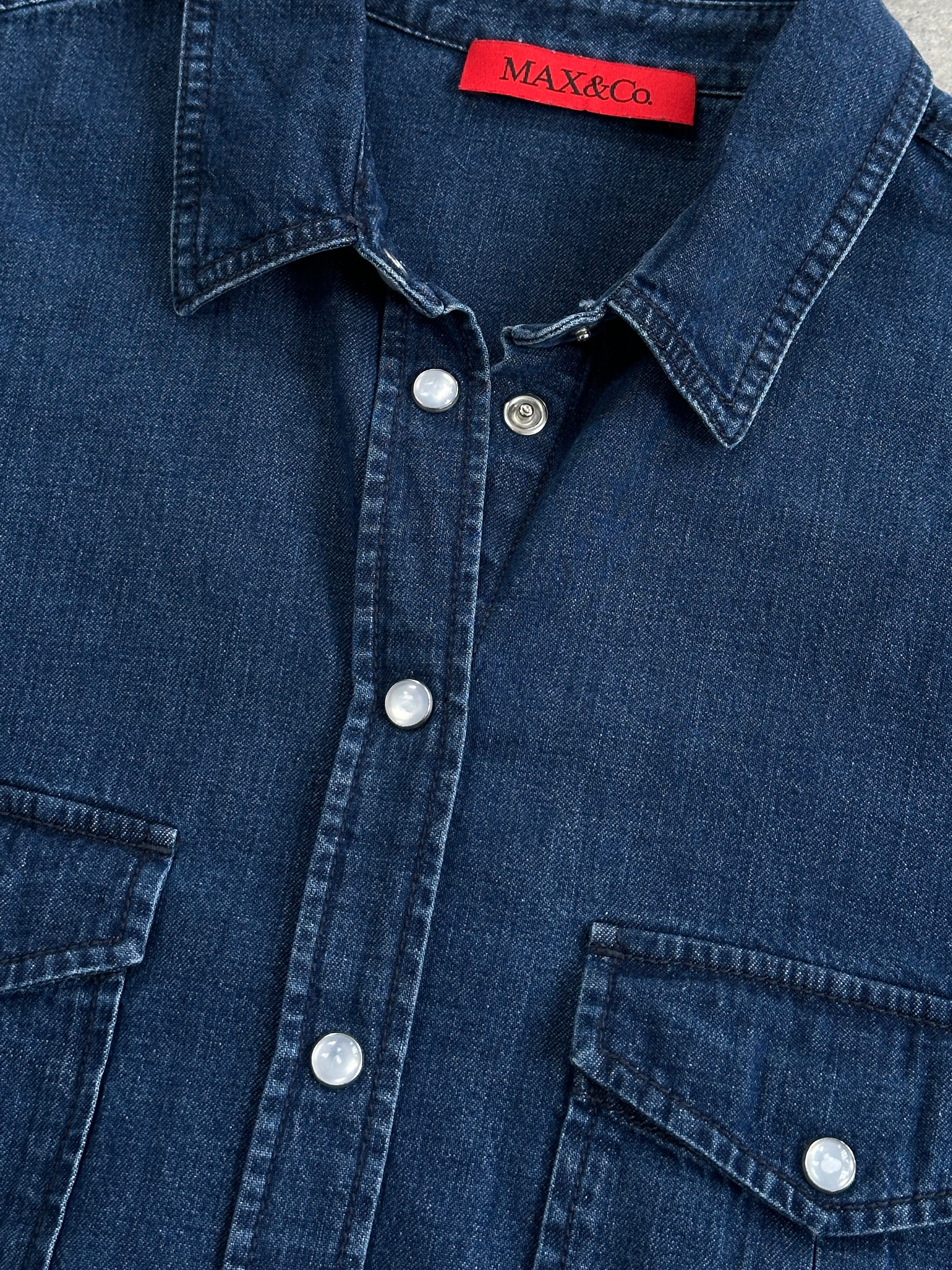 MAX & Co pure cotton denim shirt in size S/M displayed on a hanger, showcasing classic collar and button-front design.