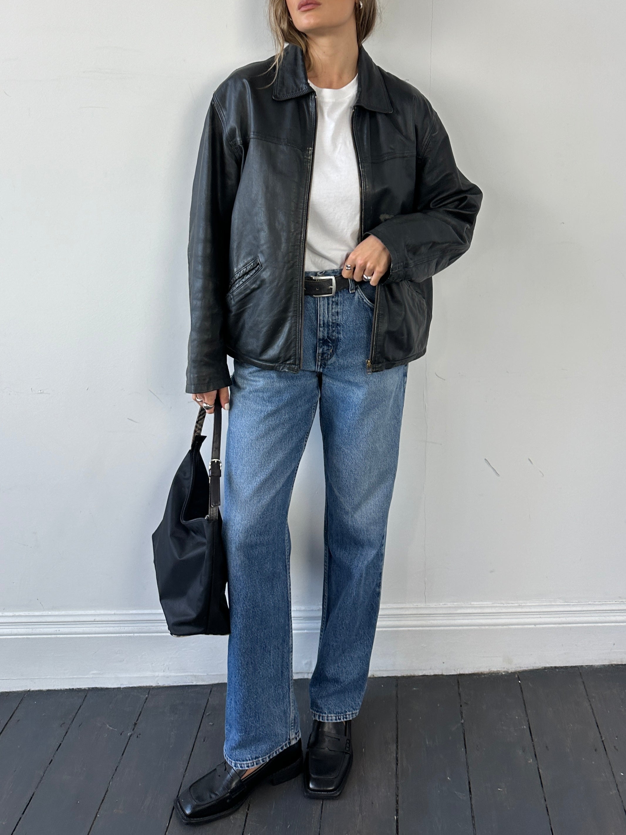 Conbipel distressed leather jacket in size L featuring a rugged, stylish design with visible distressed details and classic leather texture.