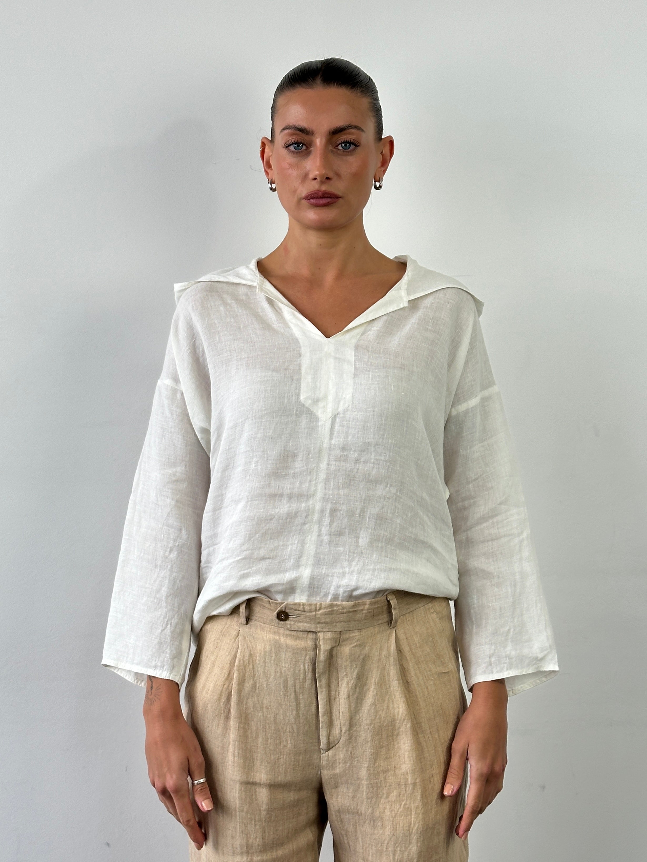 Max Mara pure linen hooded tank top in S/M, featuring a relaxed fit and casual hood, shown in a light linen fabric.