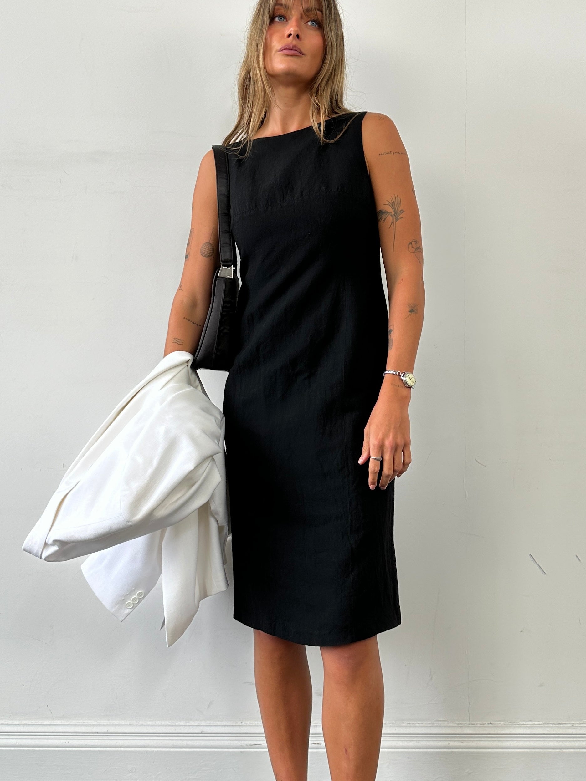 Laura Ashley linen midi shift dress in size small, featuring a classic silhouette and light, textured fabric for a chic look.
