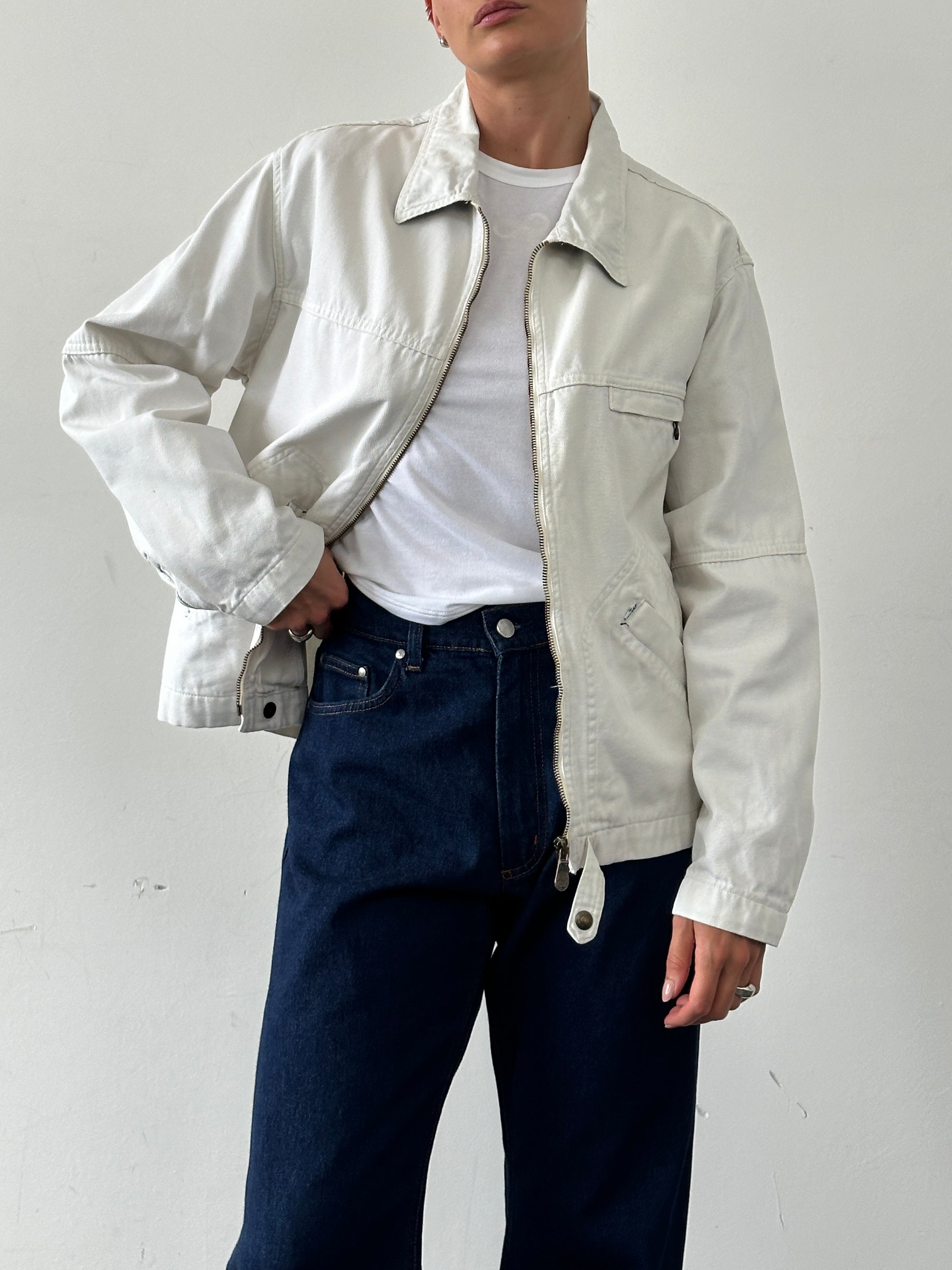 Levi’s cotton zip-up bomber jacket in size large, featuring a classic design with a front zipper and ribbed cuffs.