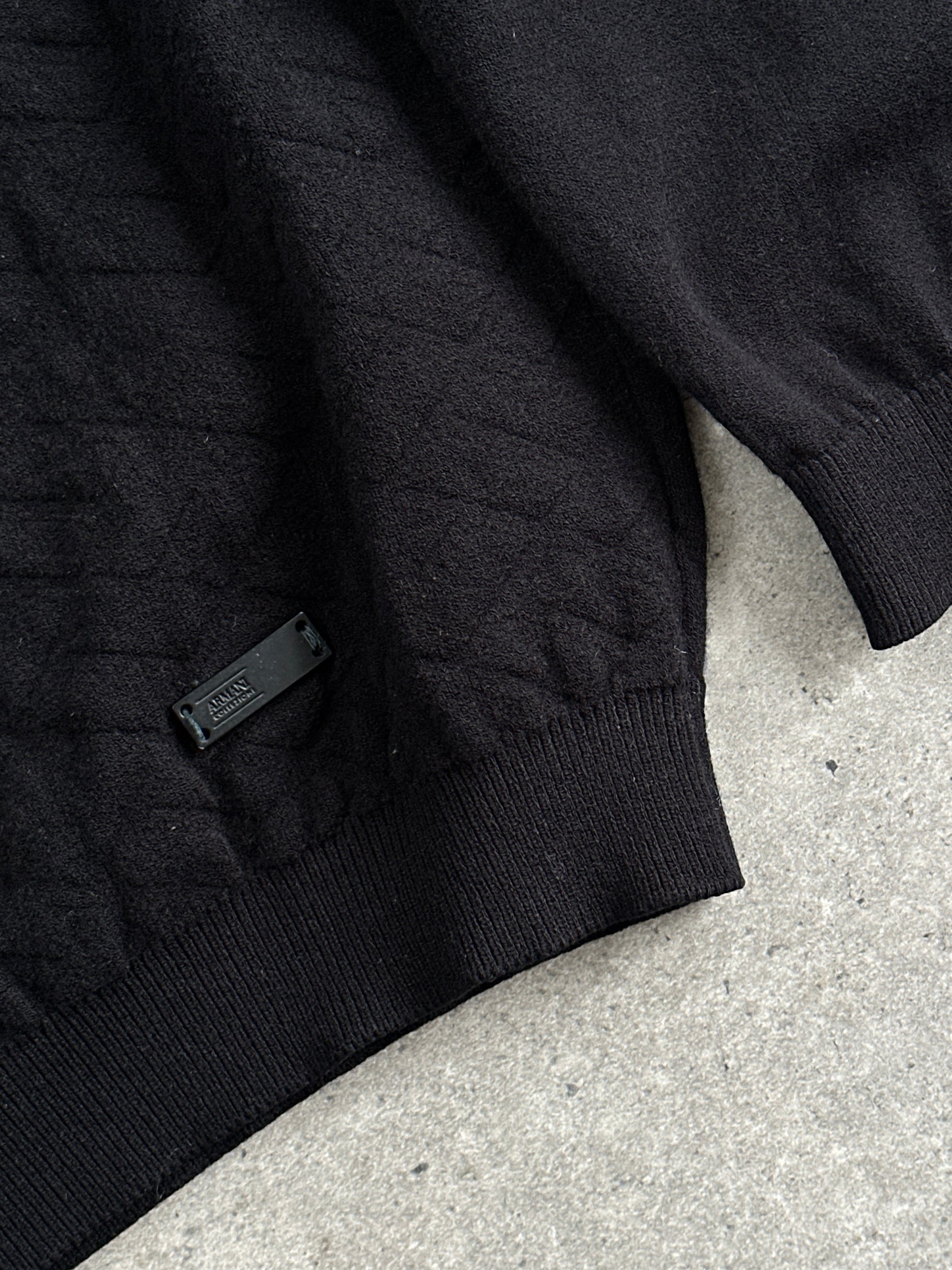 Armani Collezioni textured jumper in size M/L, featuring a knit pattern and classic fit, displayed on a plain background.