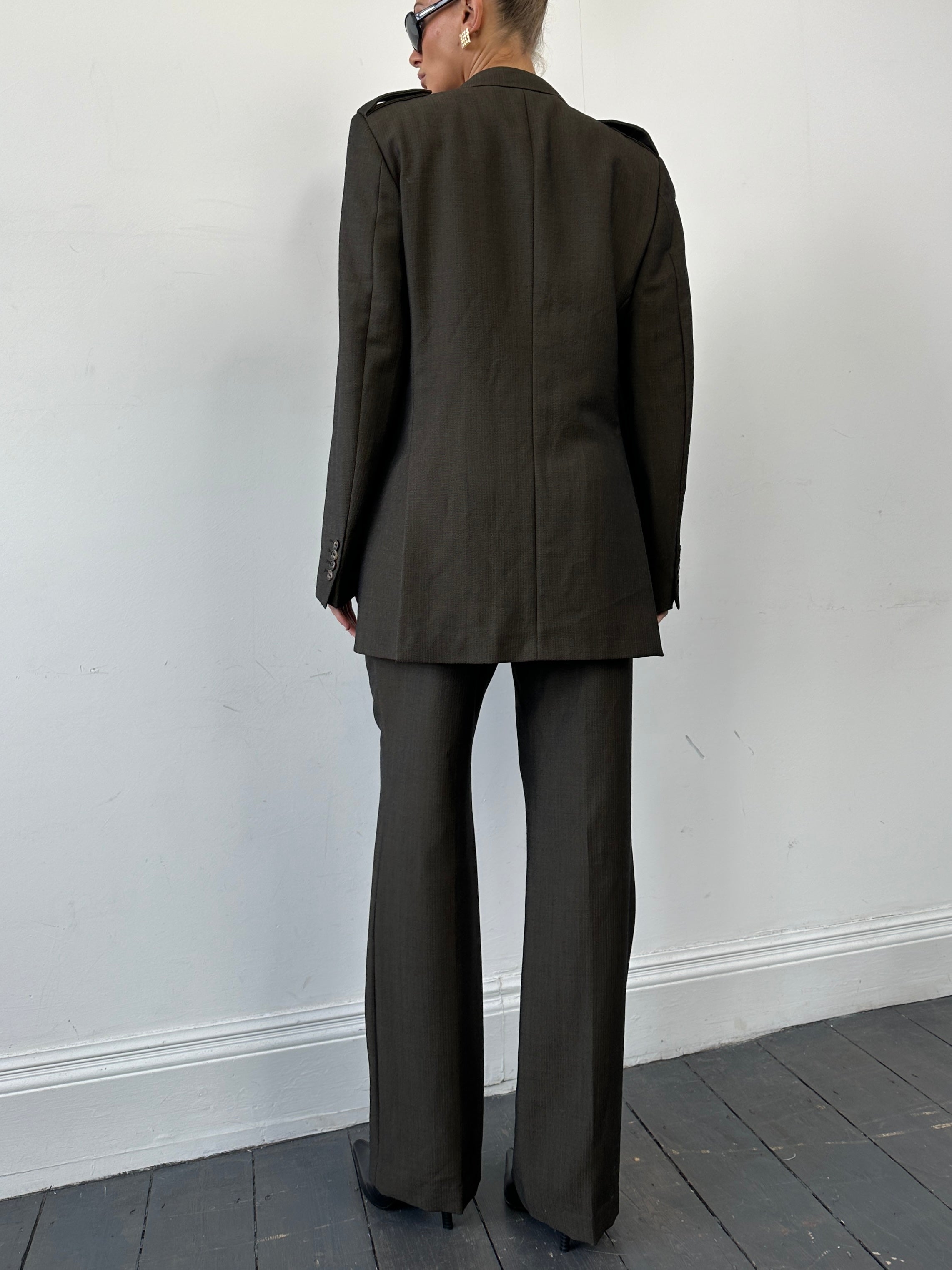 Gucci wool mohair single-breasted jumpsuit in size 40L/W30, featuring tailored design and classic style.