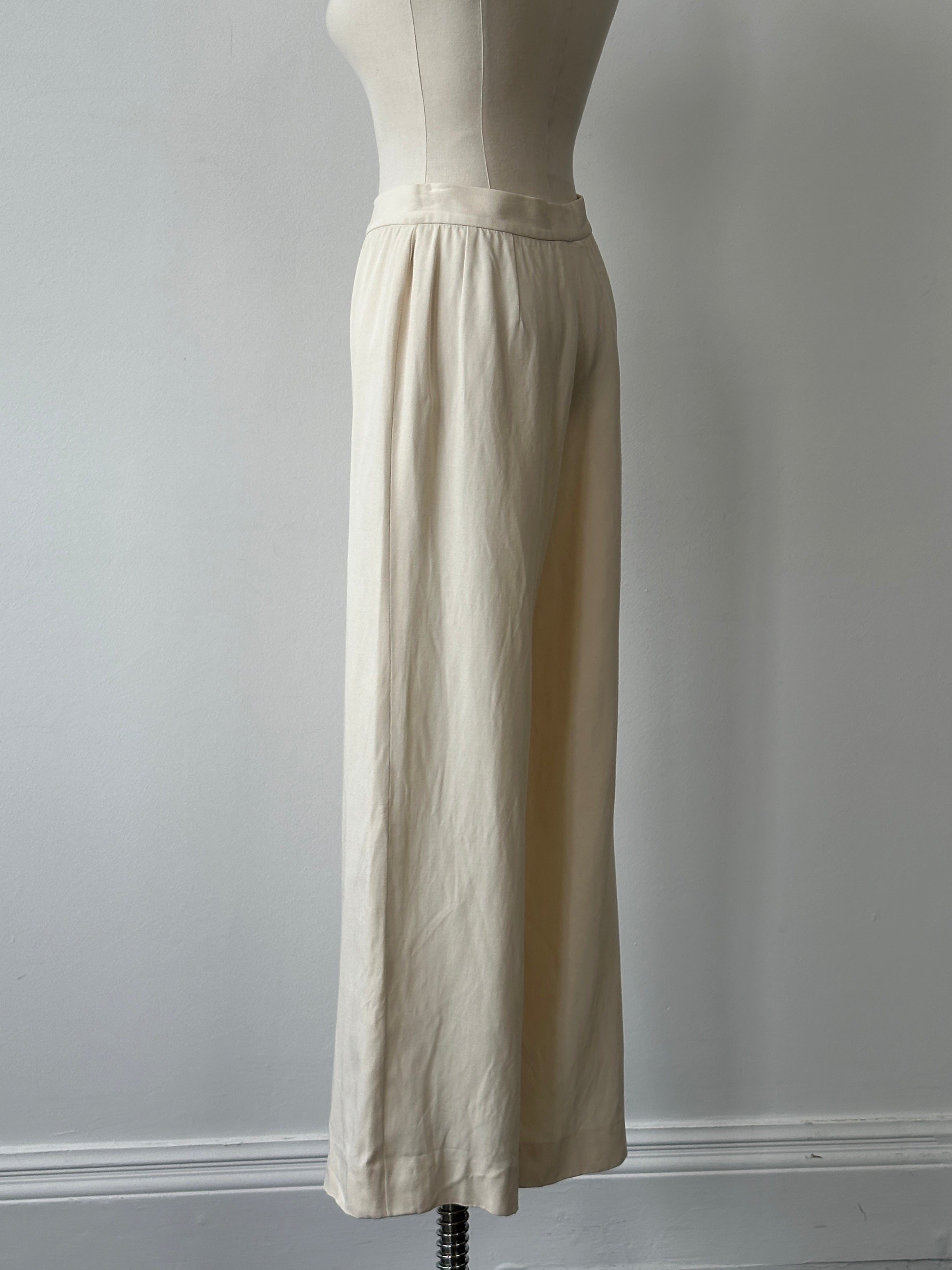 Giorgio Armani 1990s wide-leg tailored trousers in W28, showing structured fabric and classic design details.