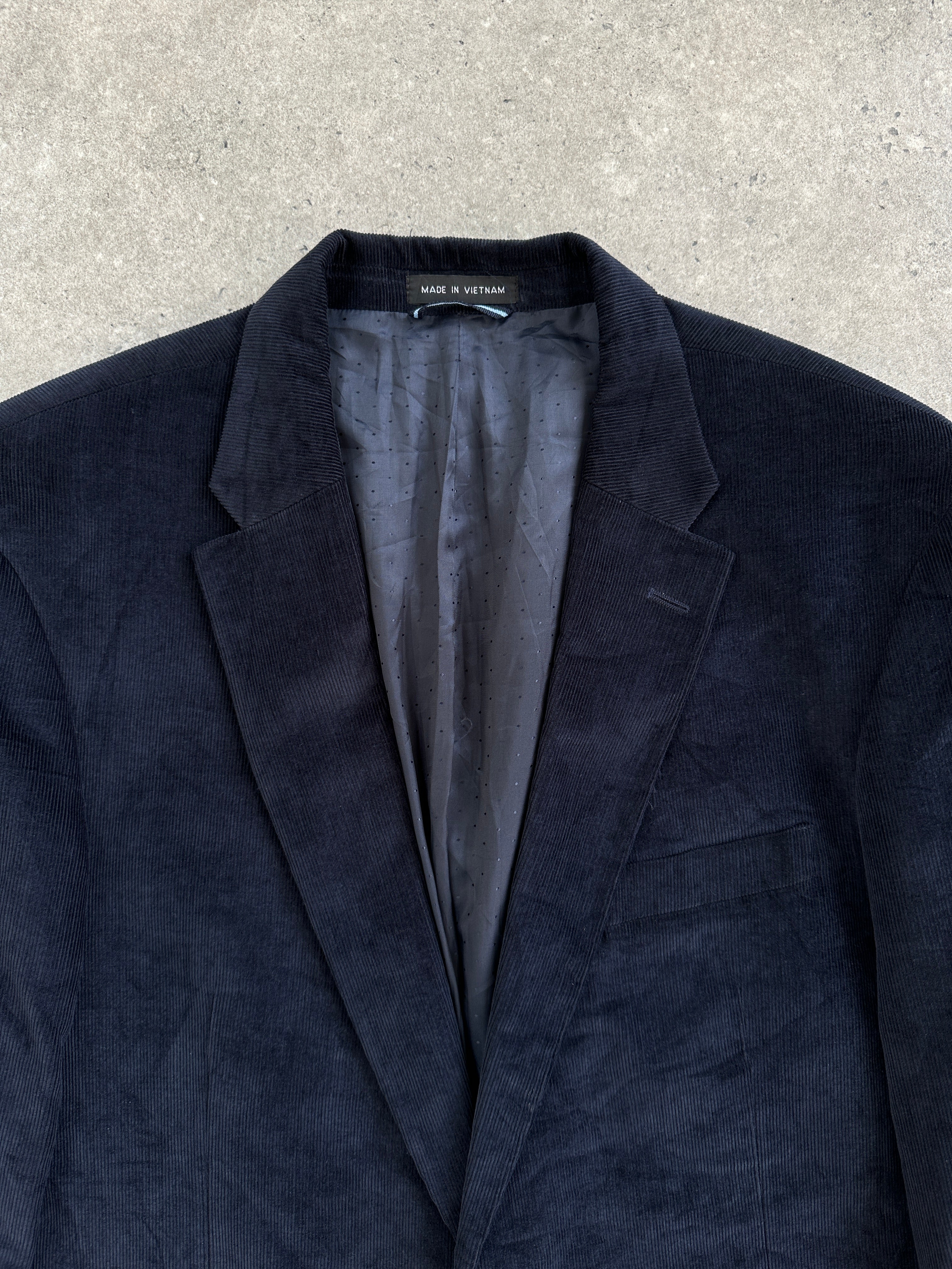 Tommy Hilfiger 2000s corduroy blazer in size 42L/XL, single-breasted design with classic lapels and tailored fit.