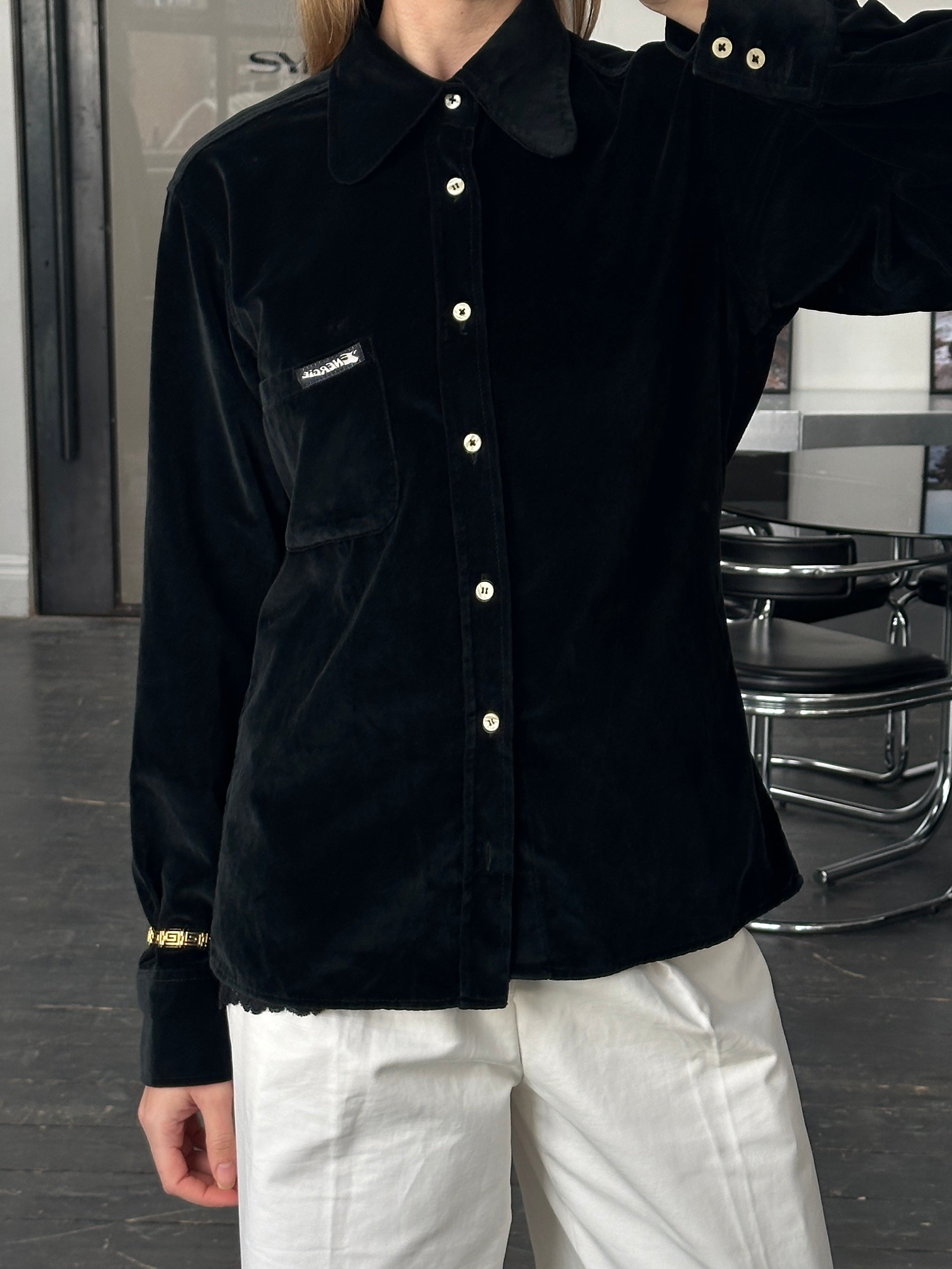 Italian vintage 1990s velvet shirt in size M, featuring a rich texture and classic design, displayed on a hanger.