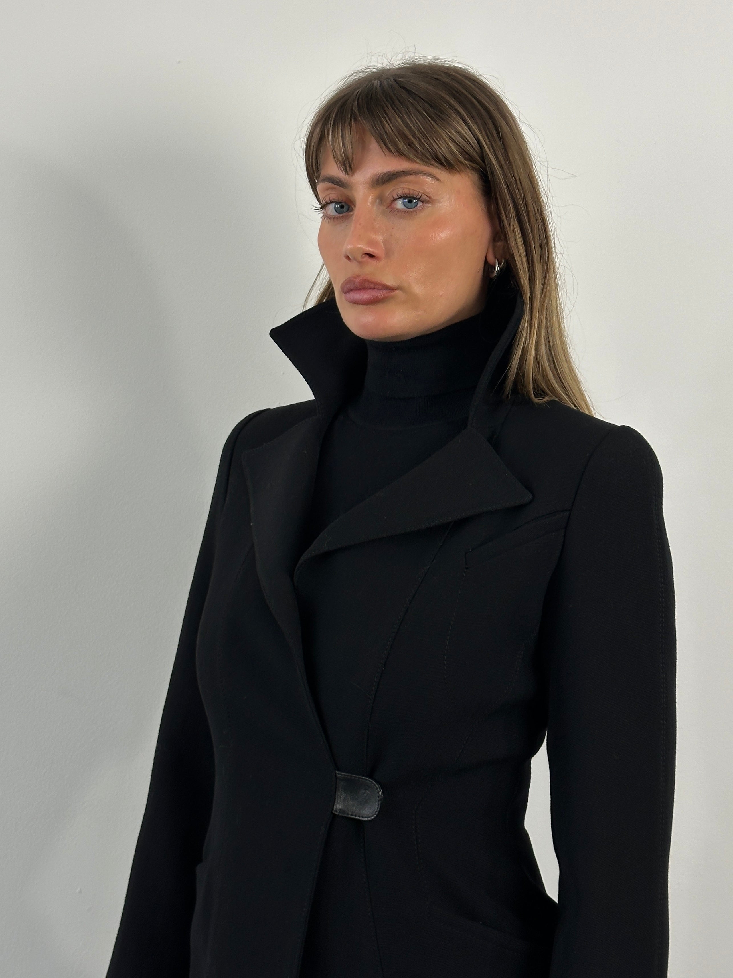 Emporio Armani 2000s pure wool tailored coat in size S, shown on a hanger with details of the classic design and fabric.