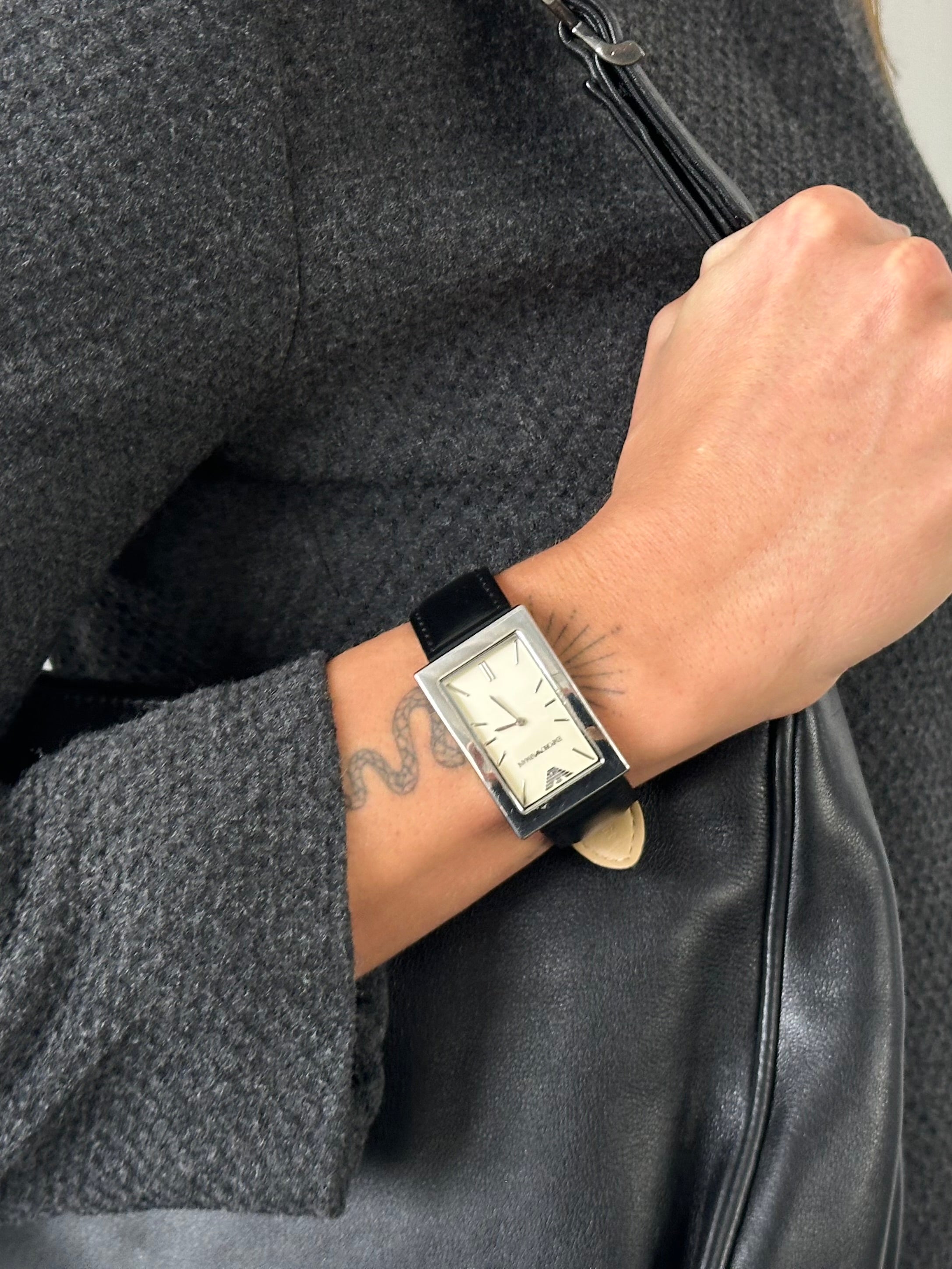 Emporio Armani 2000s rectangle stainless steel leather watch with silver dial and black leather strap, stylish men's accessory.