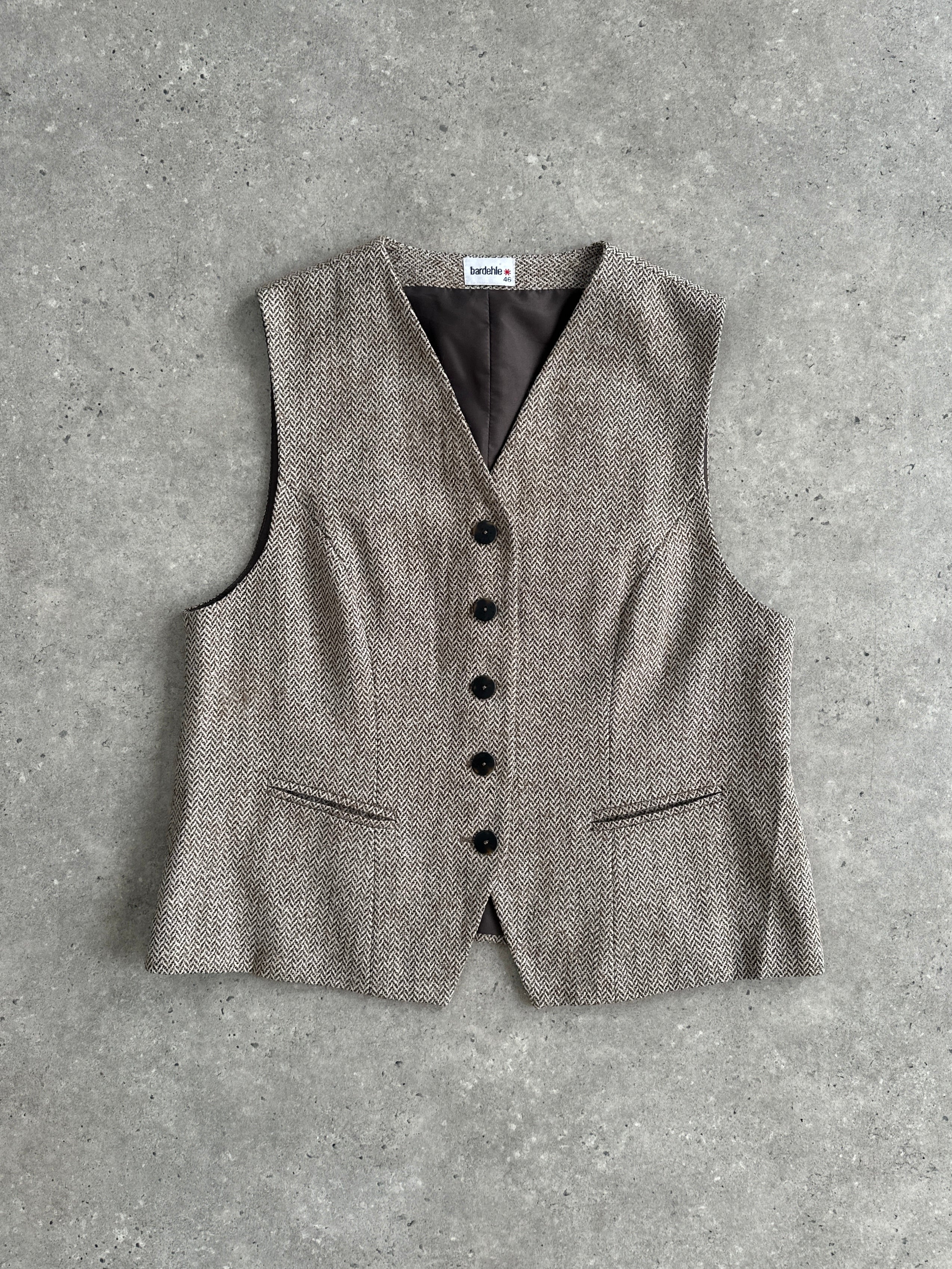 Vintage 1990s virgin wool herringbone waistcoat in XL, featuring classic pattern and tailored fit, displayed on a neutral background.