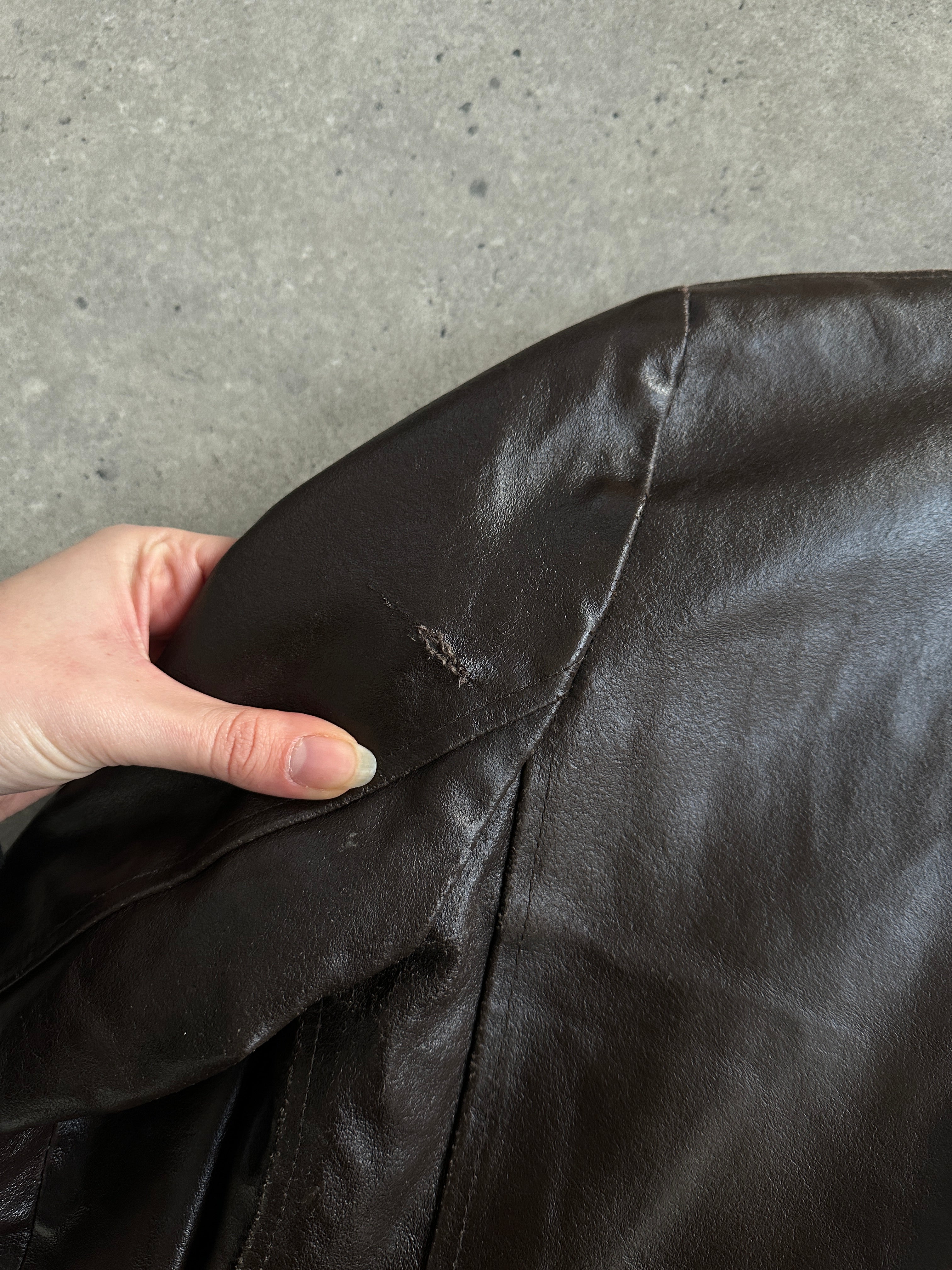 Vintage smooth leather jacket in size S, stylish men's or women's leather jacket with classic design and clean finish.