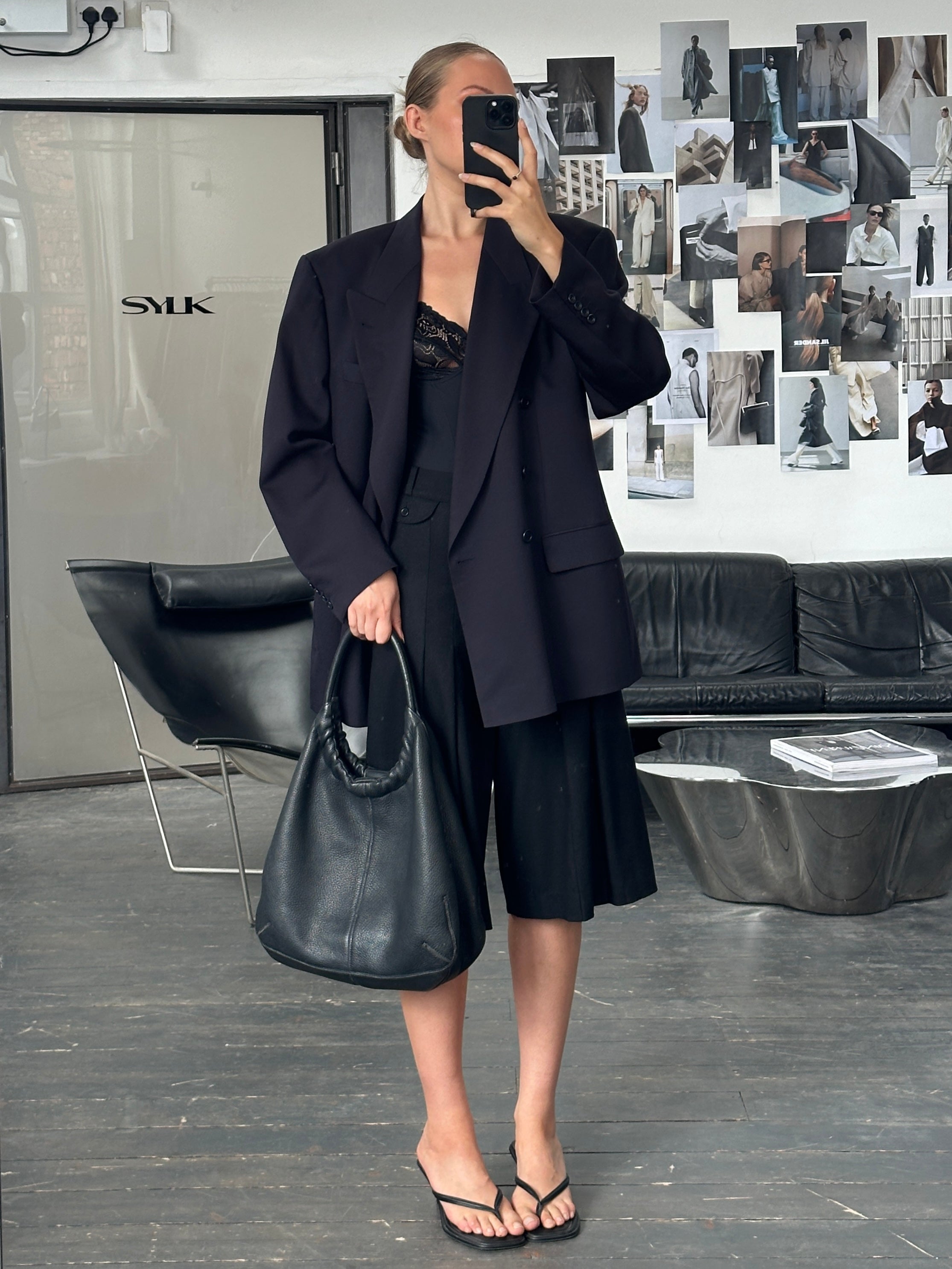 Hugo Boss 1990s double-breasted wool blazer in size 44L/XL, tailored fit with classic lapels and button closures.