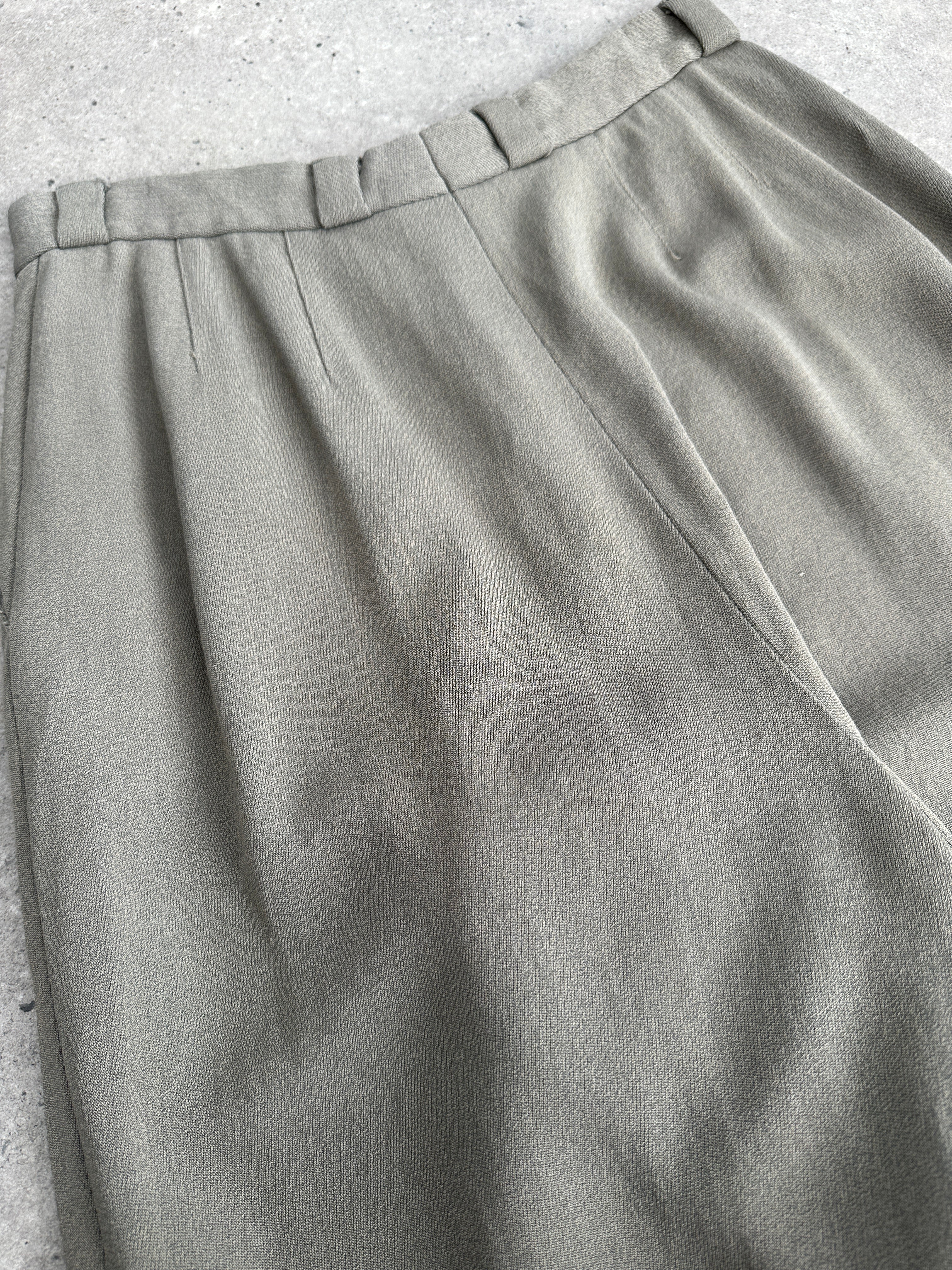 Giorgio Armani high-waisted tapered leg trousers in black, showcasing a tailored fit and sleek design.