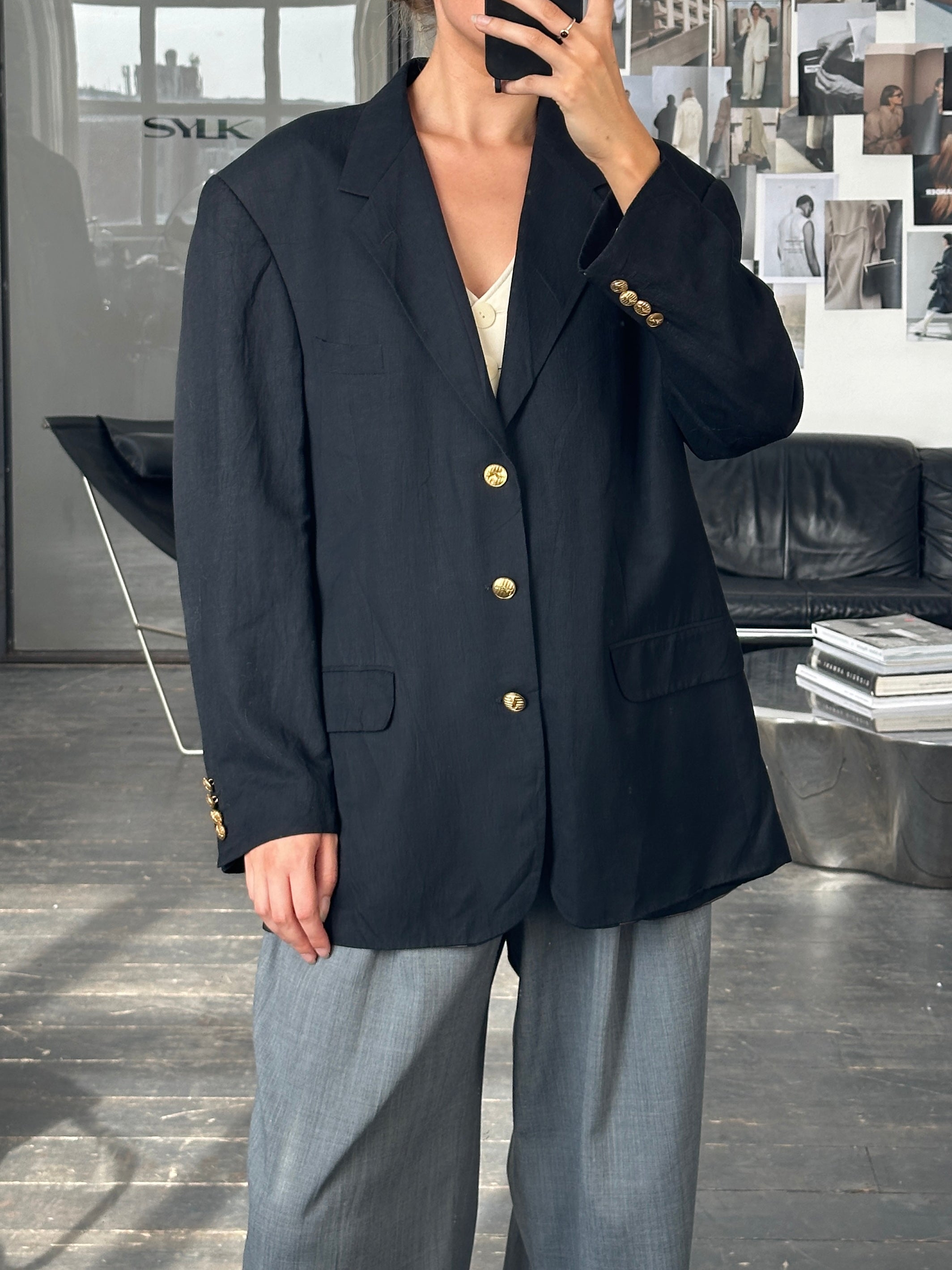 Yves Saint Laurent 1990s bespoke button blazer in size 44R/XL, tailored fit with classic lapel and button details.
