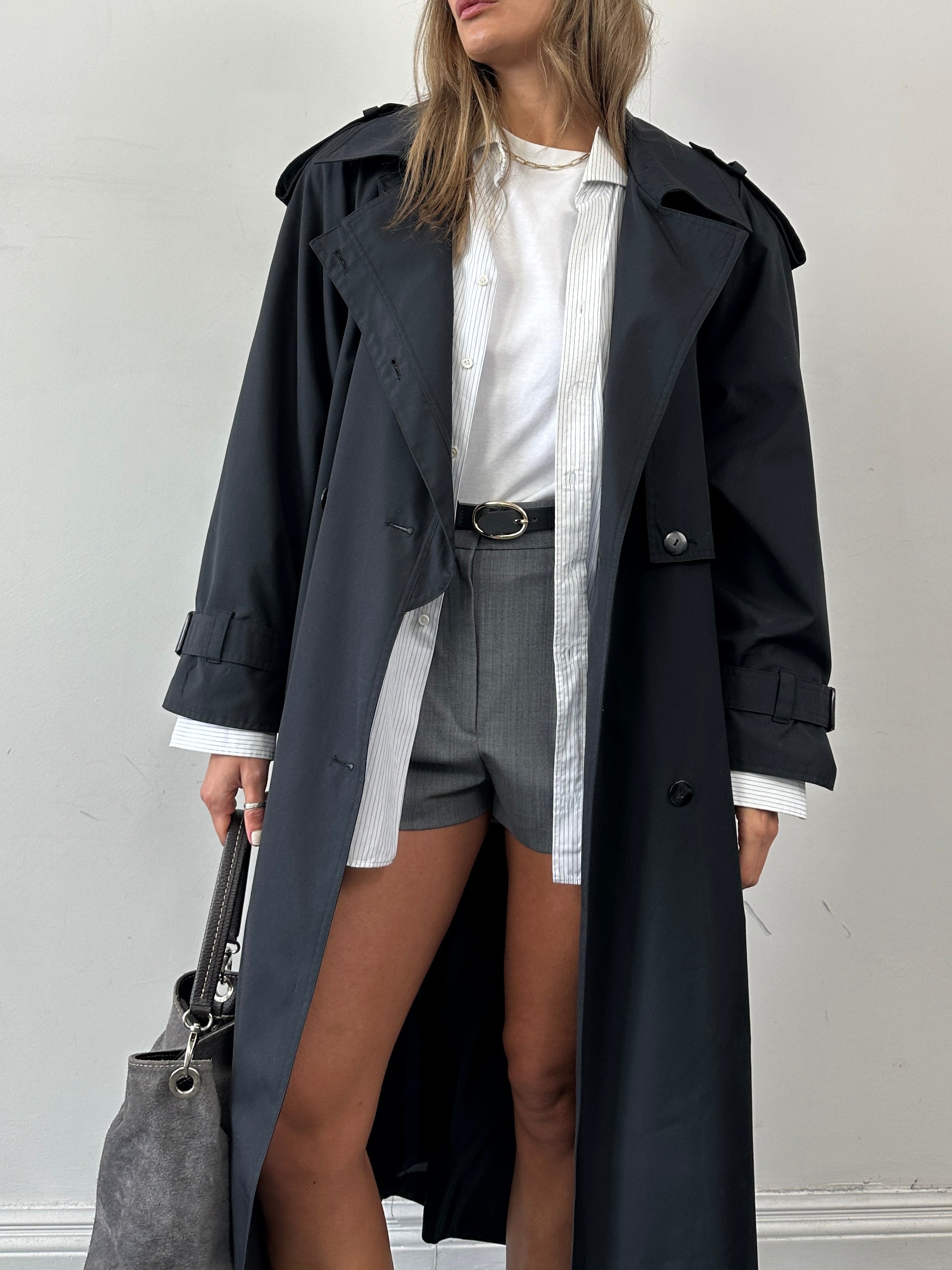 Vintage double-breasted floor-length belted trench coat in XL, showcasing classic style and timeless design.