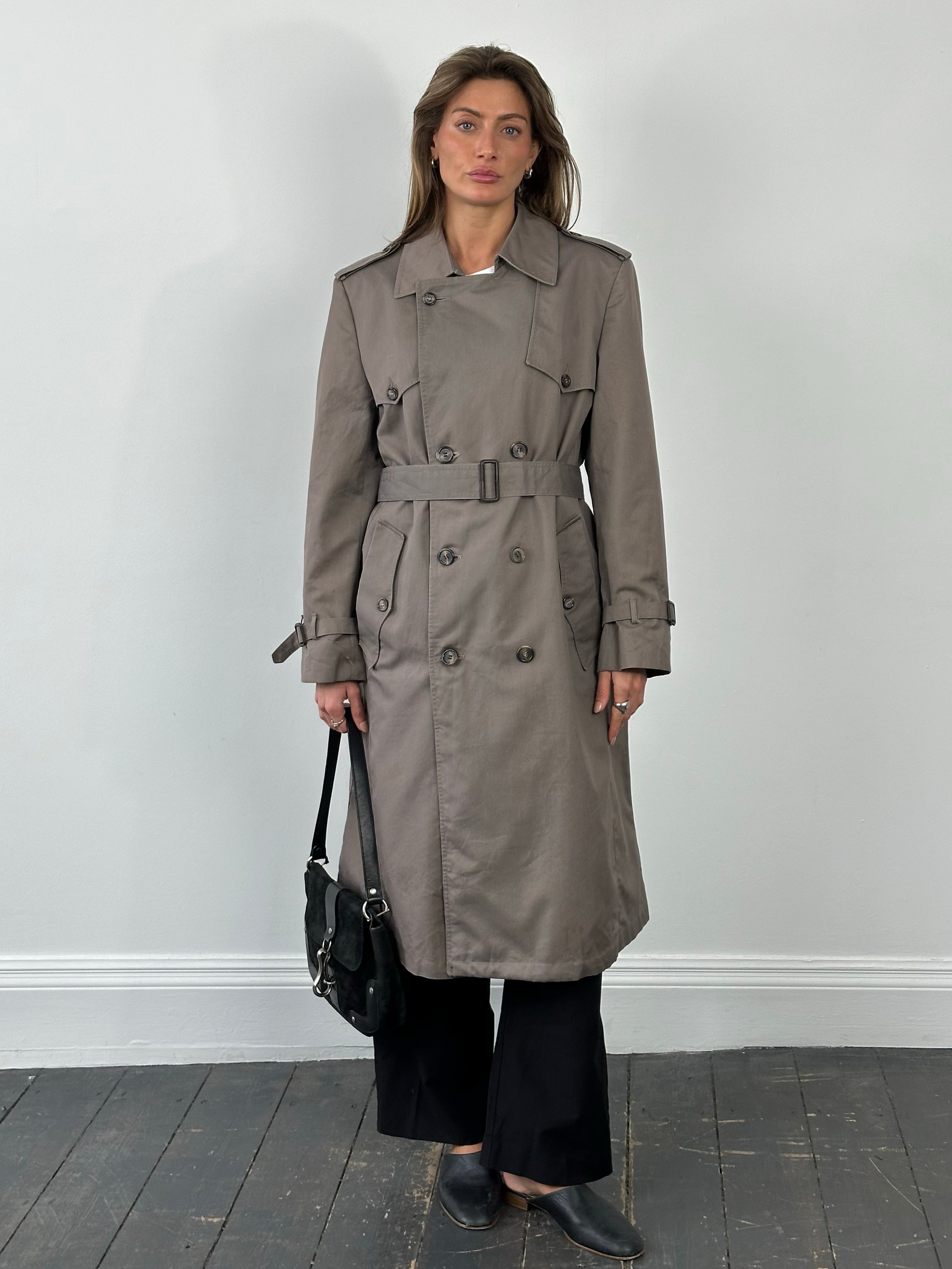 Christian Dior Monsieur 1980s double-breasted belted trench coat in beige, featuring classic design and tailored fit.