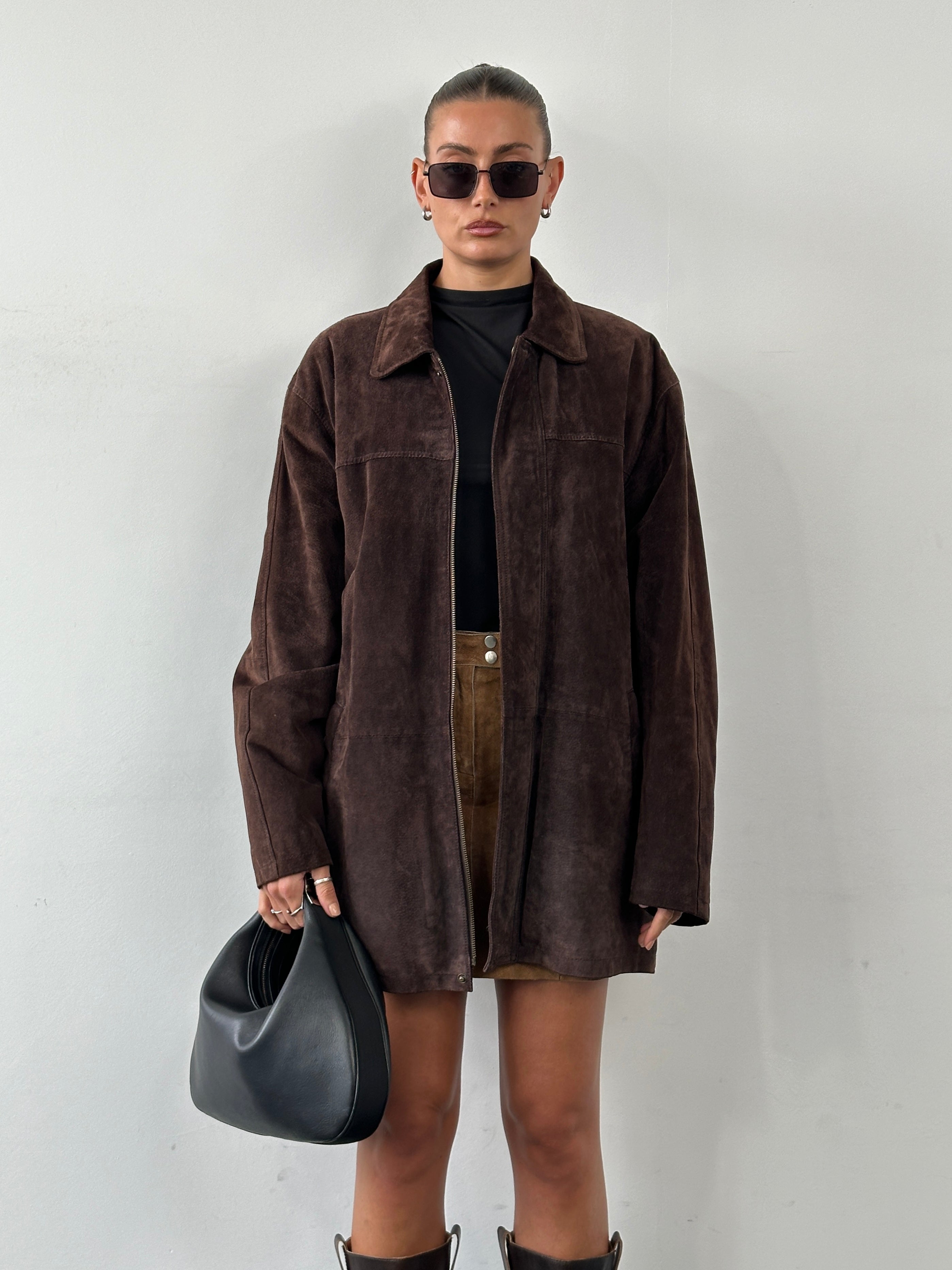 Balmain mid-length suede jacket in XL, featuring a stylish design with a soft suede texture and tailored fit.