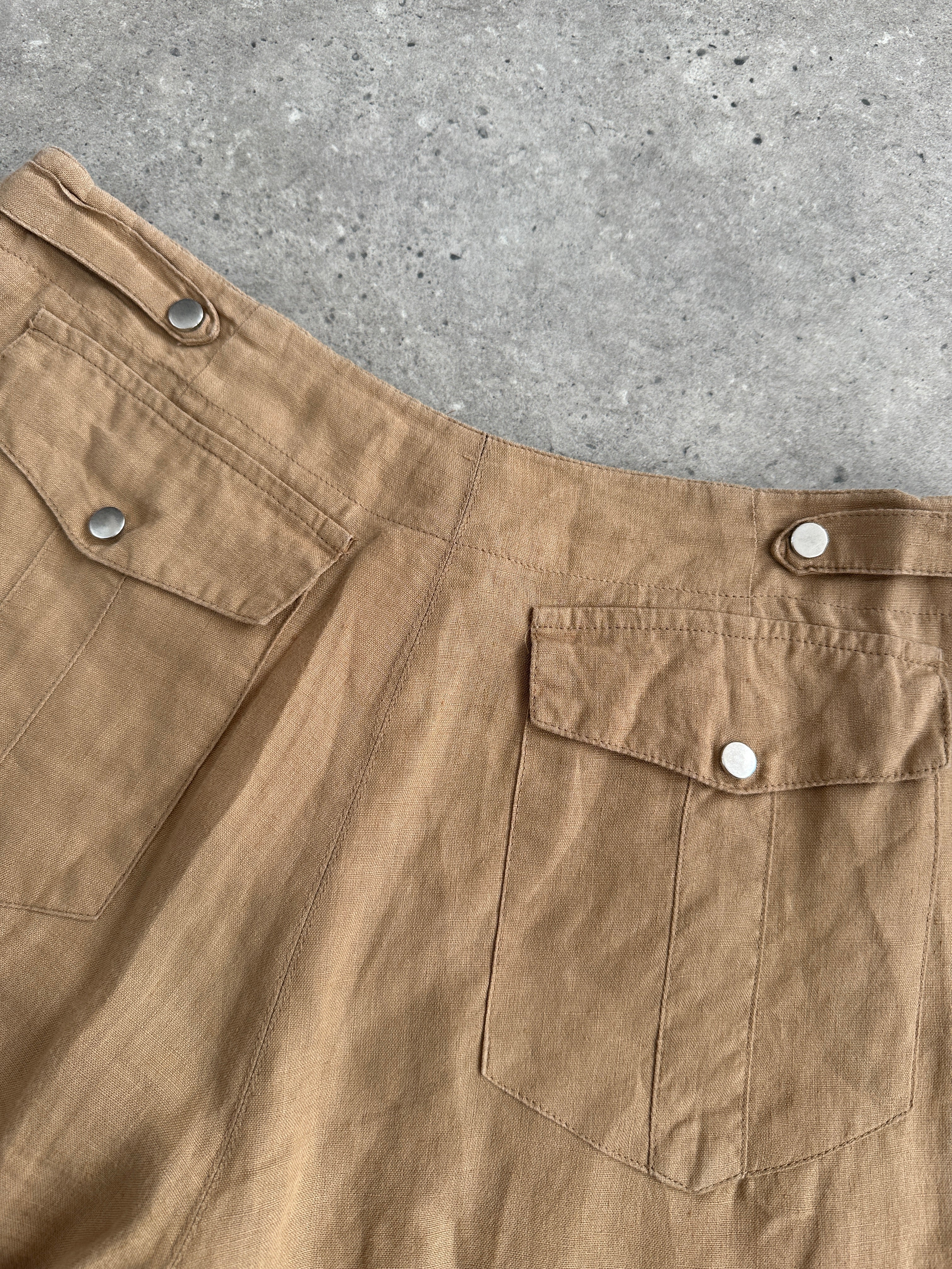 Vintage pure linen low waist wide-leg trousers in natural fabric, showing relaxed fit and wide leg design with a W26 size.