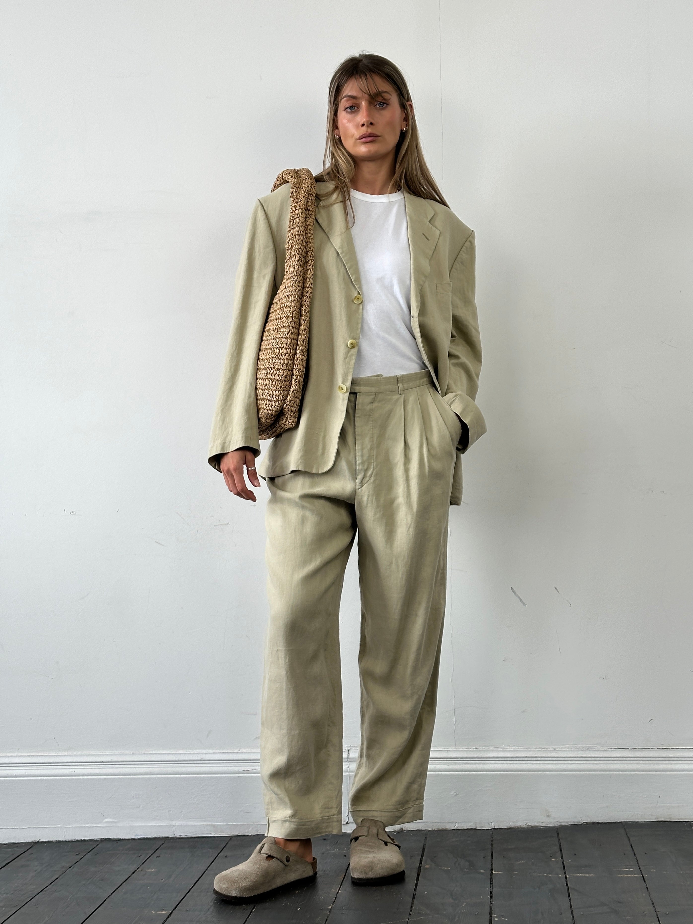 Christian Dior Monsieur linen single-breasted jumpsuit in size 42S/W32, tailored fit with elegant fabric and classic design.