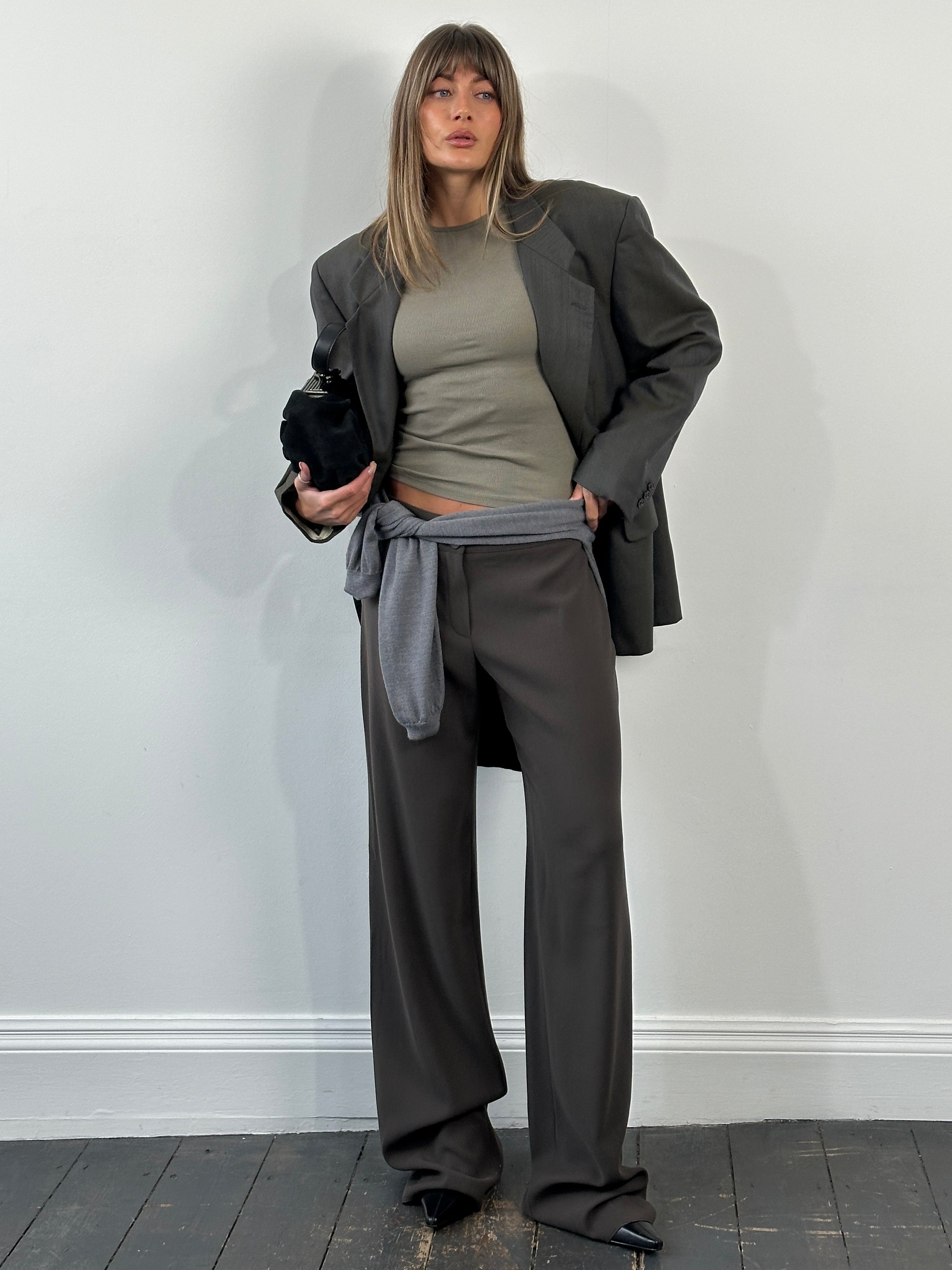 Armani Collezioni 2000s pure wool wide-leg tailored trousers in size W32, showing the fit and fabric detail.