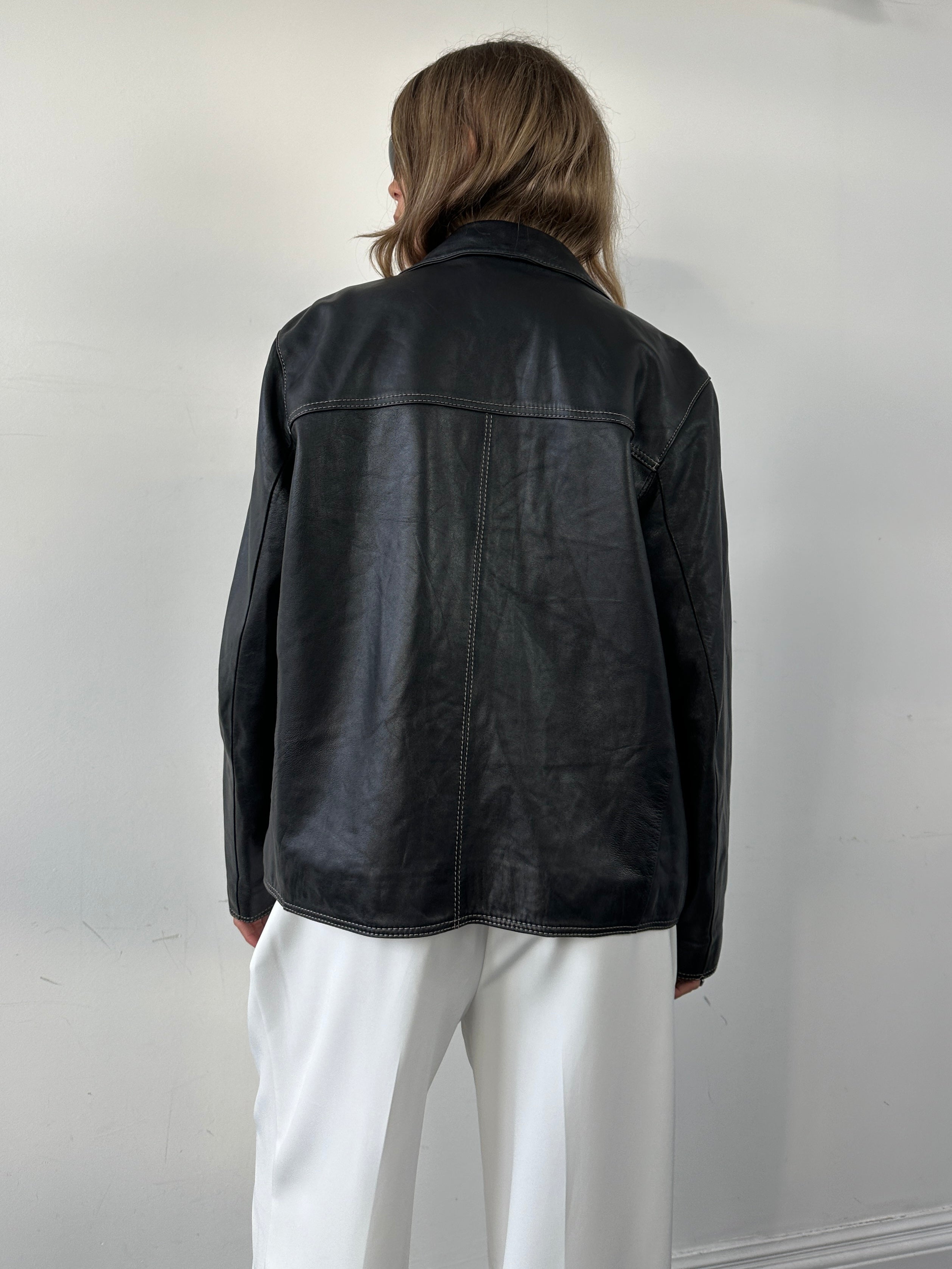 Vintage contrast stitch leather jacket in medium size, showcasing classic design and premium leather craftsmanship.