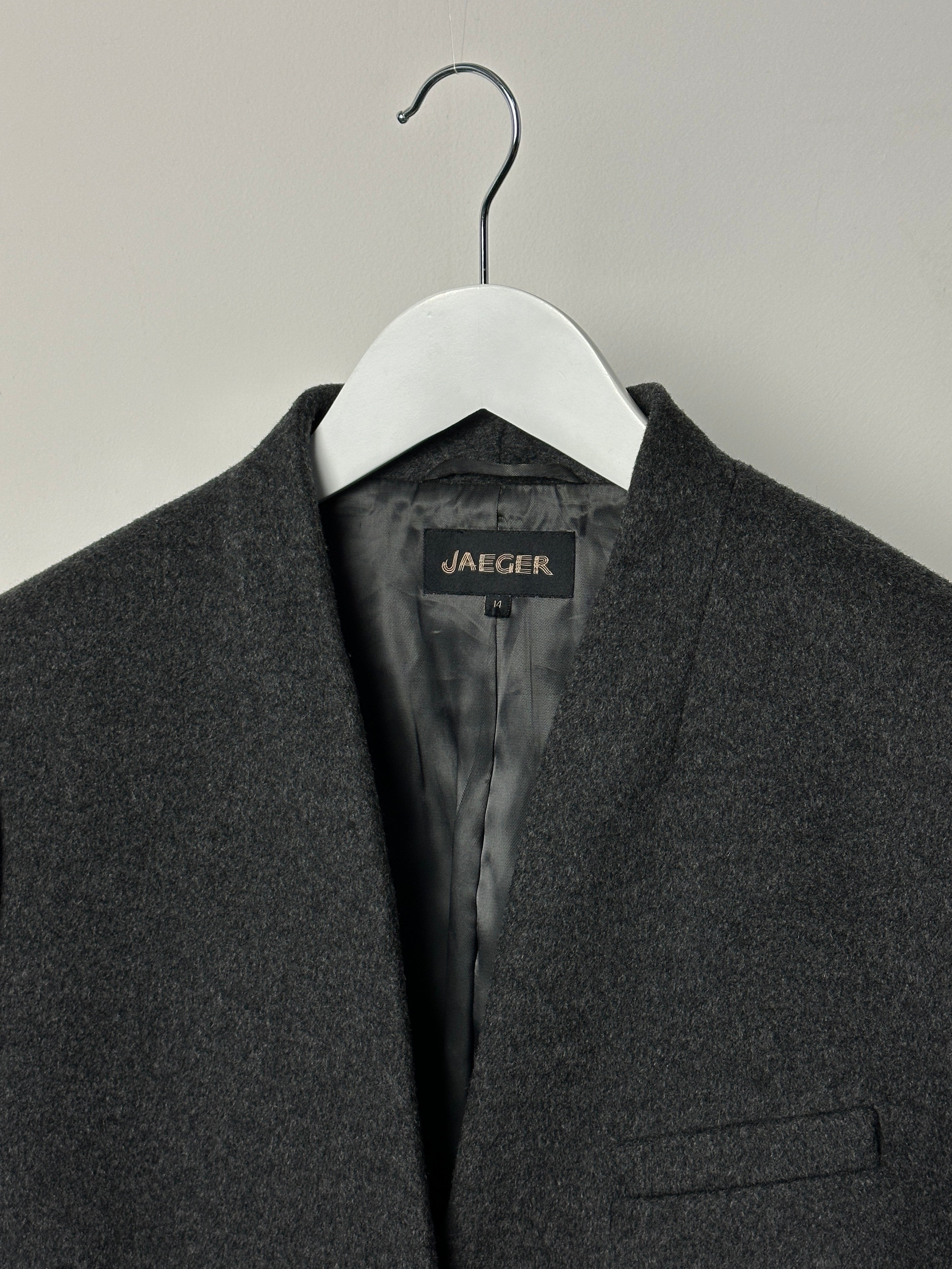 Jaeger minimal wool cashmere coat in size M, shown on a hanger, featuring a sleek design and neutral color.