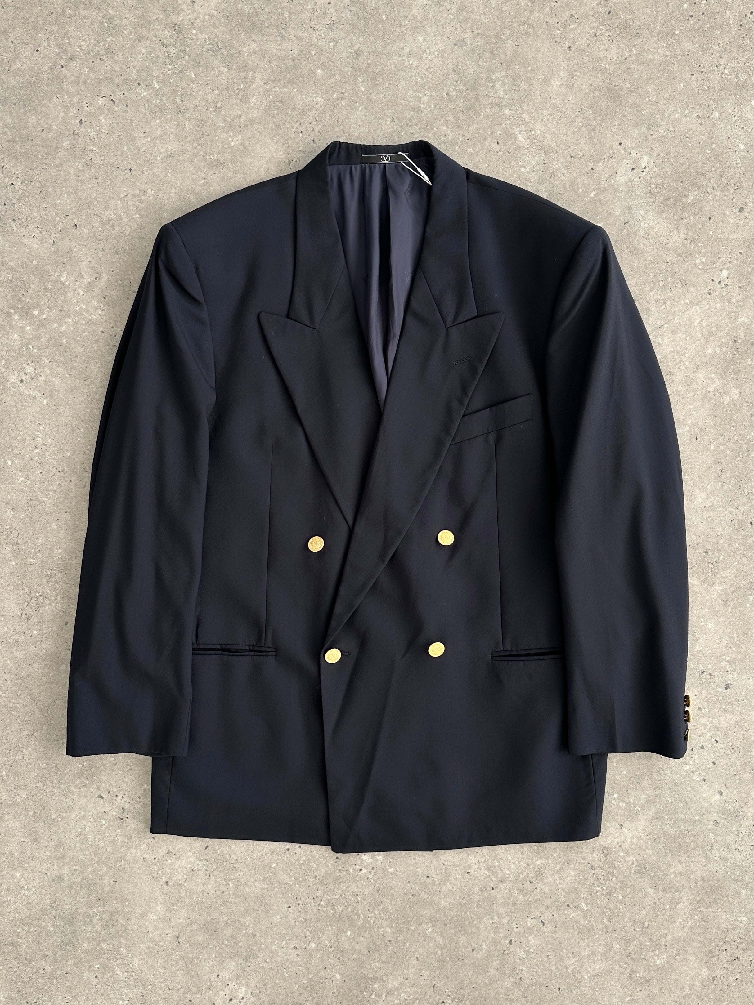 Valentino pure wool double-breasted blazer in size 42R/XL, tailored fit with classic lapel and button closure, in a neutral color.