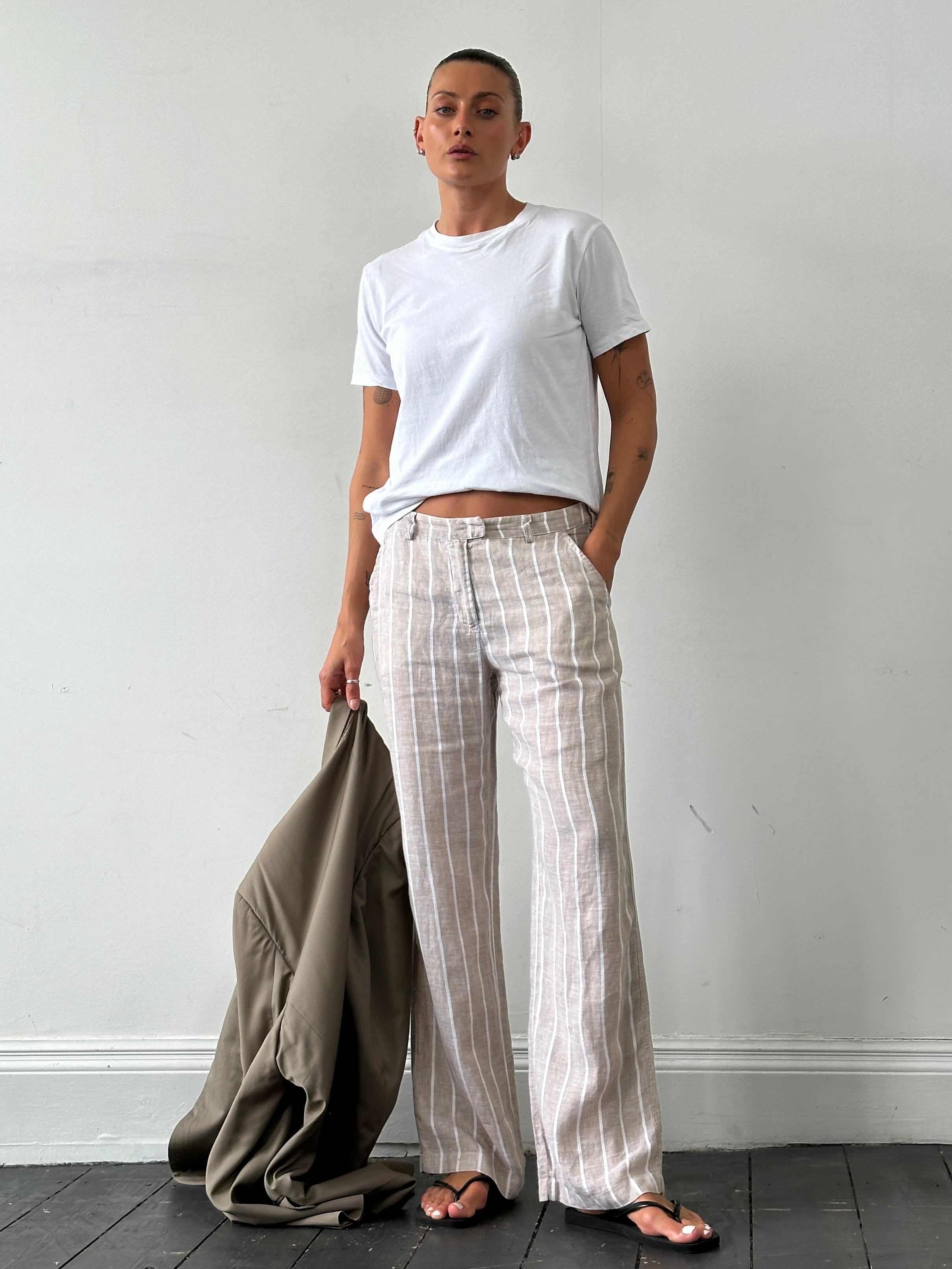 Armani Jeans pure linen wide-leg mid-rise stripe trousers with belt loops and front pockets, in a relaxed fit.