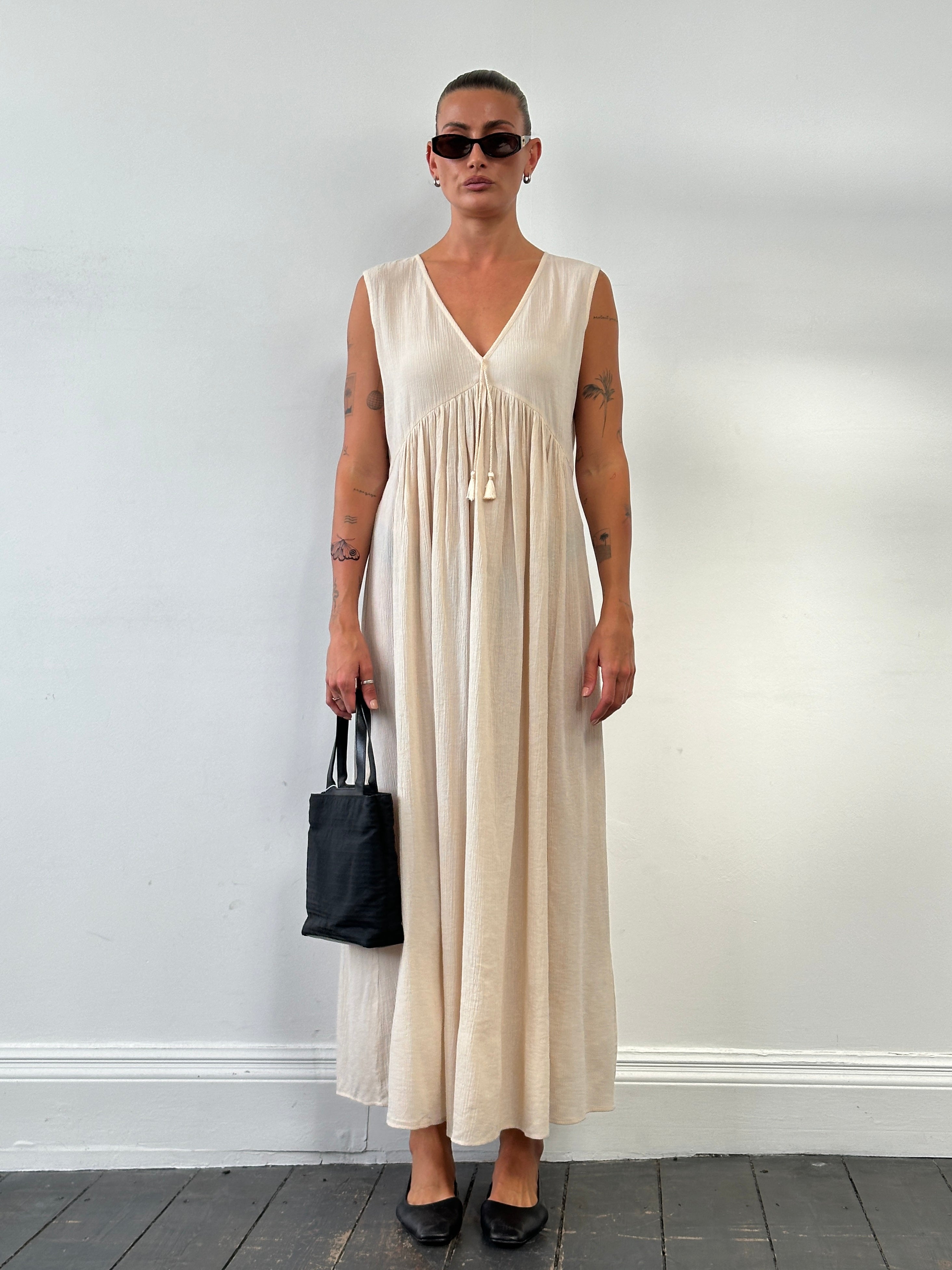 Max Mara pure cotton floor-length sun dress in UK12, featuring a flowing silhouette and sleeveless design.