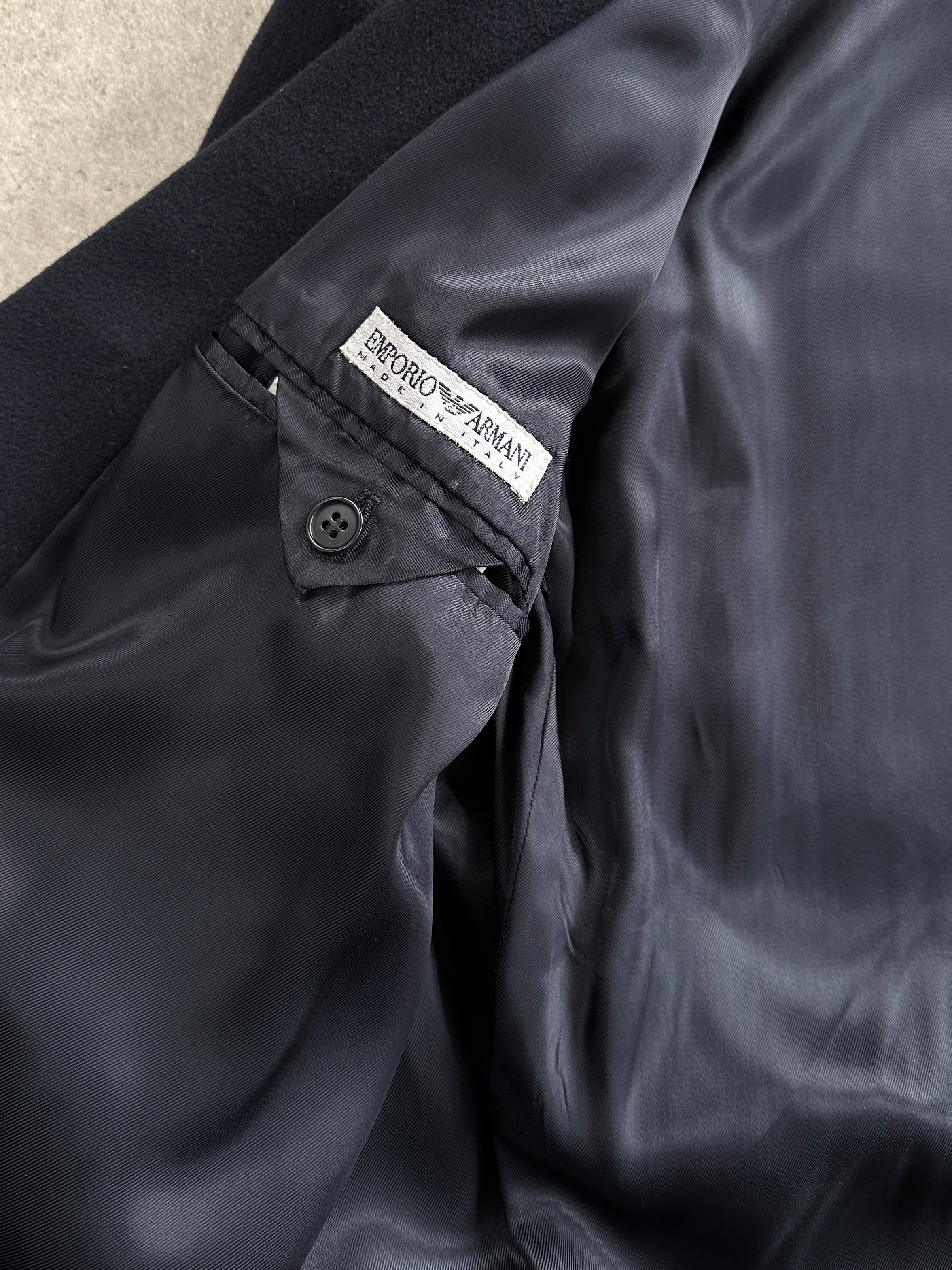 Emporio Armani 1990s wool and cashmere double-breasted coat in size L/XL, featuring classic tailored design and neutral color.