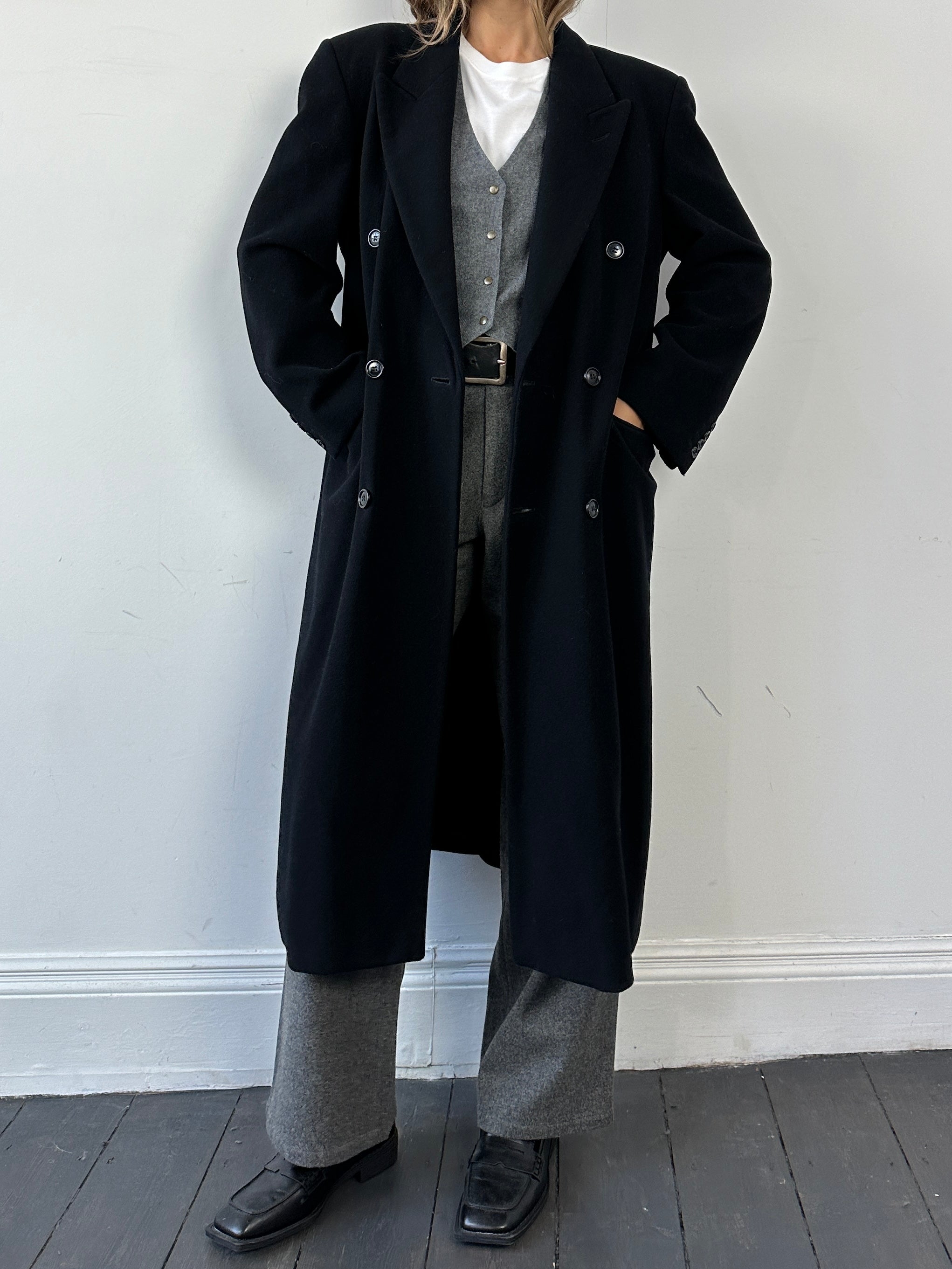 Pierre Cardin double-breasted wool cashmere coat in size M, displayed on a hanger with a classic tailored design.