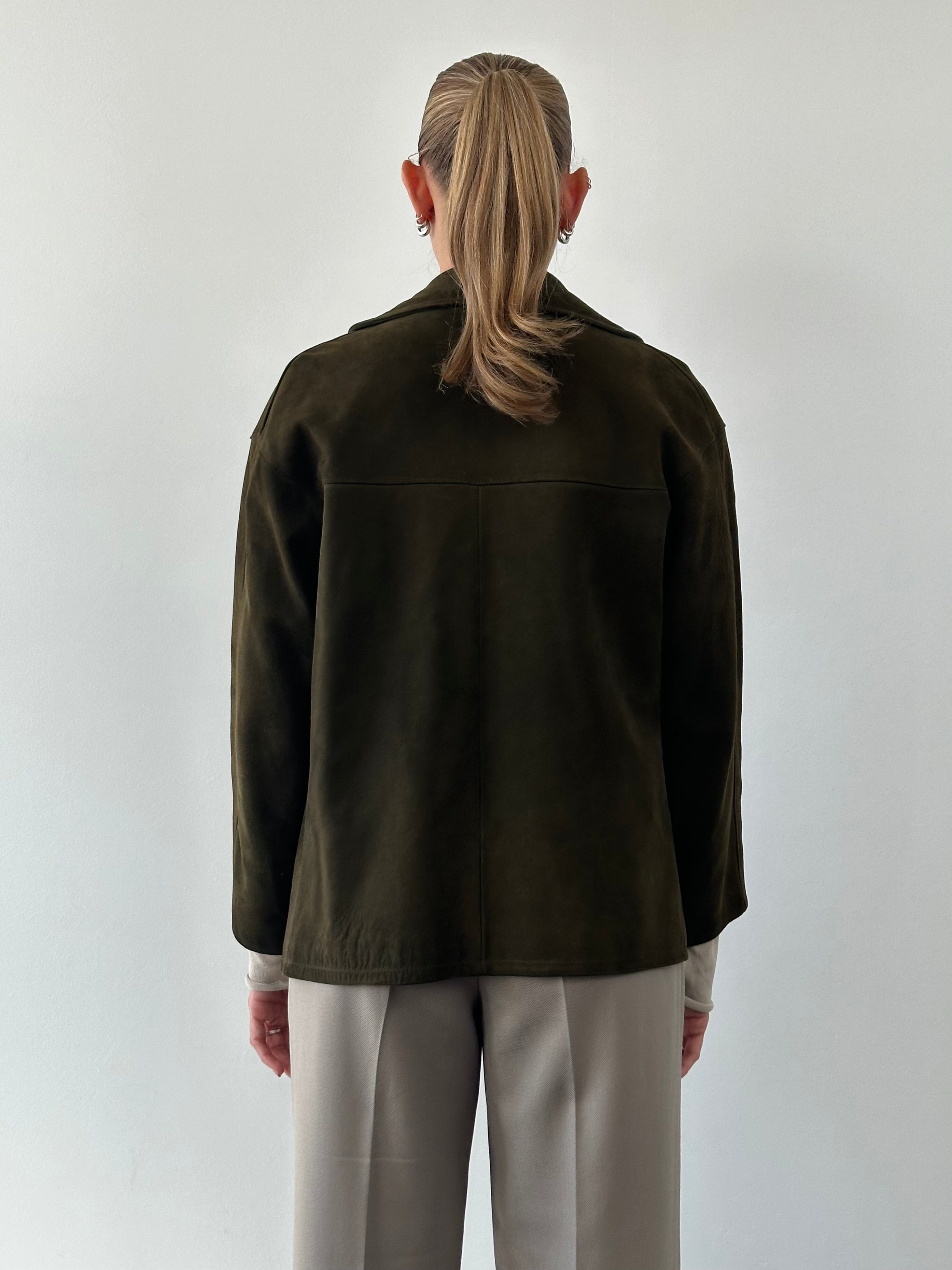 Vintage suede blazer jacket in size M, featuring classic tailored fit and stylish design, shown on a hanger.
