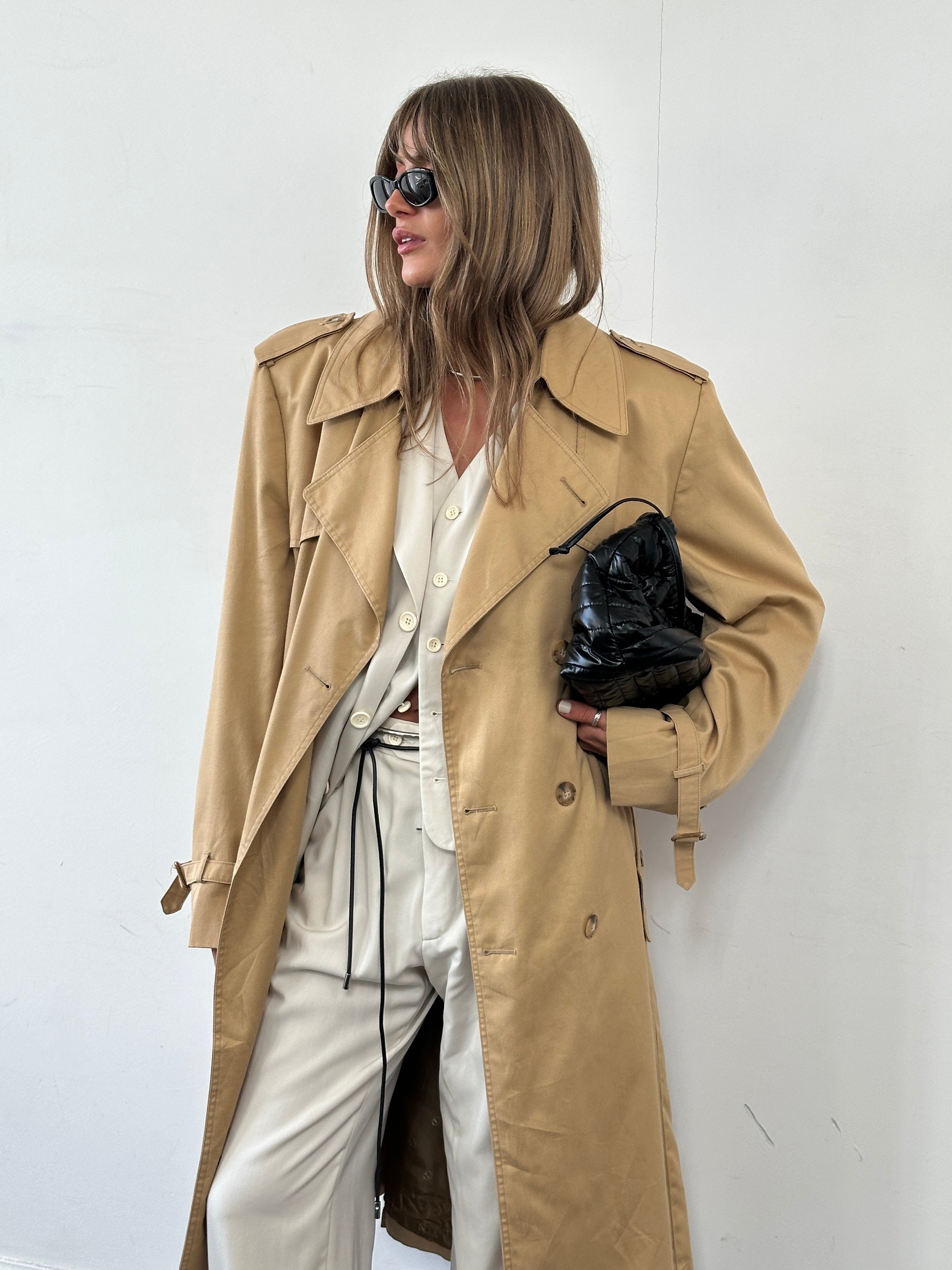 Christian Dior cotton double-breasted trench coat in size L/XL, featuring classic design and button details.