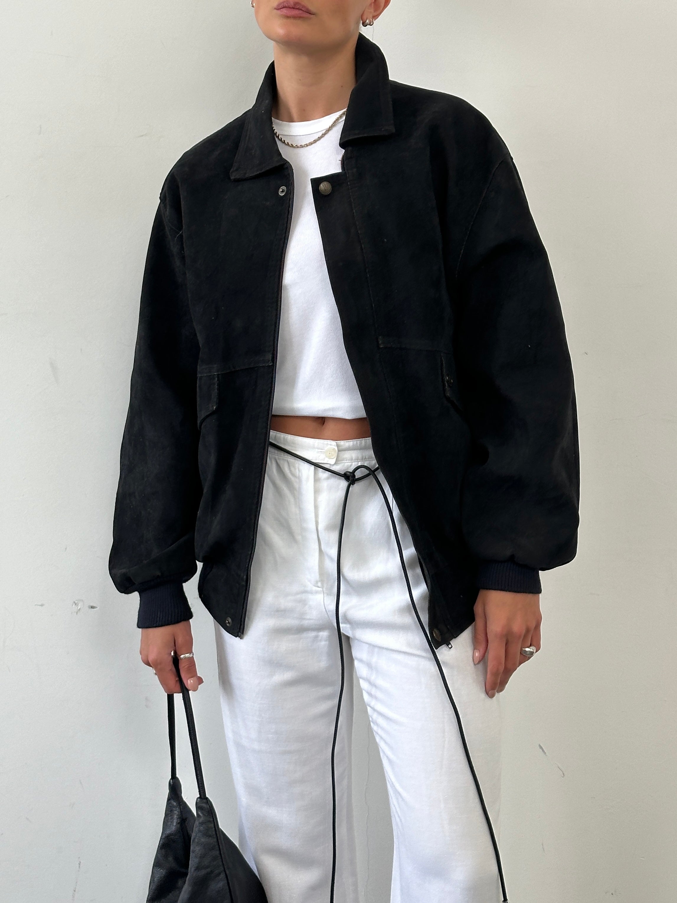 Vintage Italian faux suede bomber jacket in XL, featuring classic design and textured brown fabric.