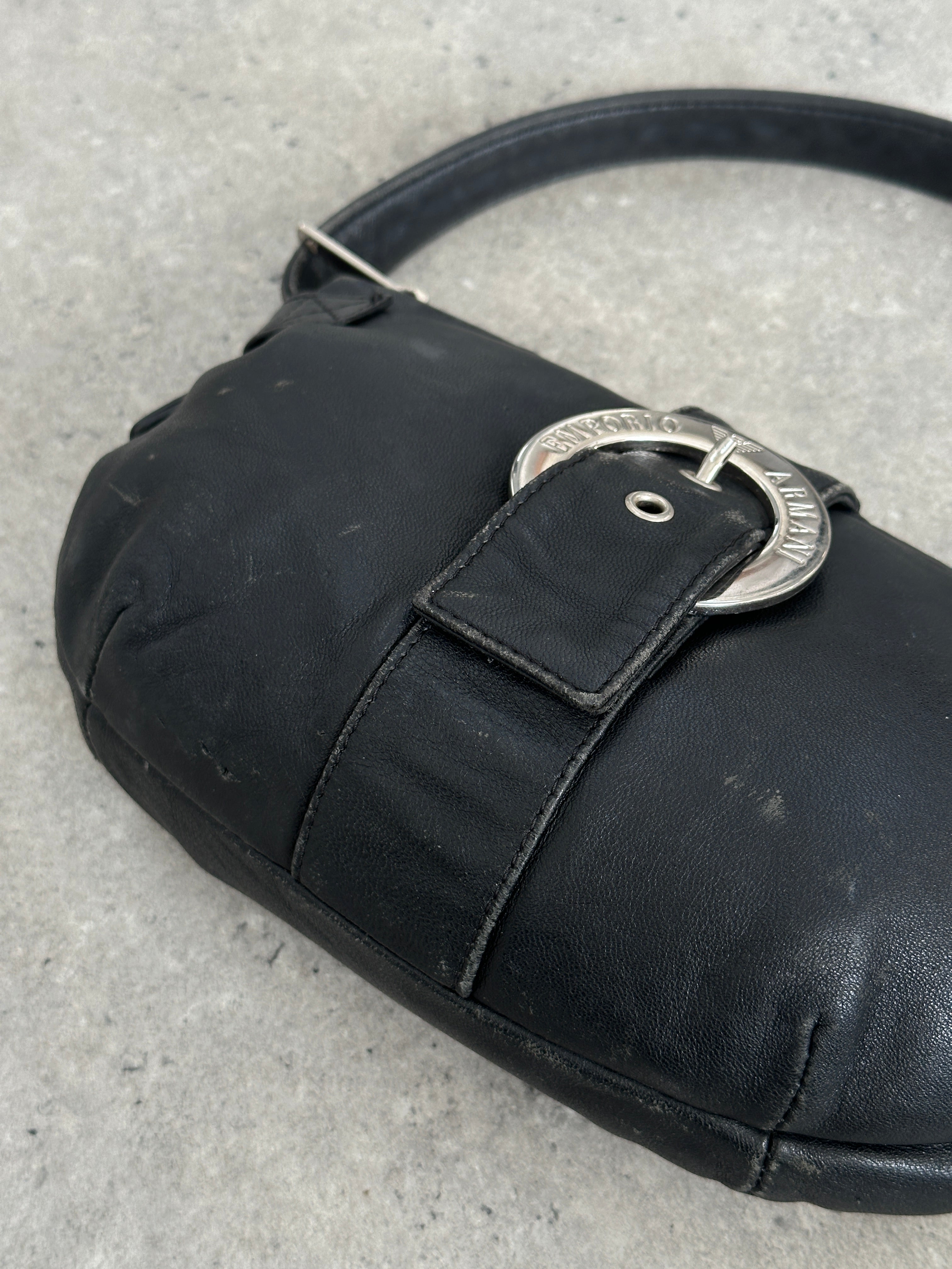 Emporio Armani 2000s aged leather shoulder bag with classic design and subtle branding, featuring a leather strap and vintage finish.