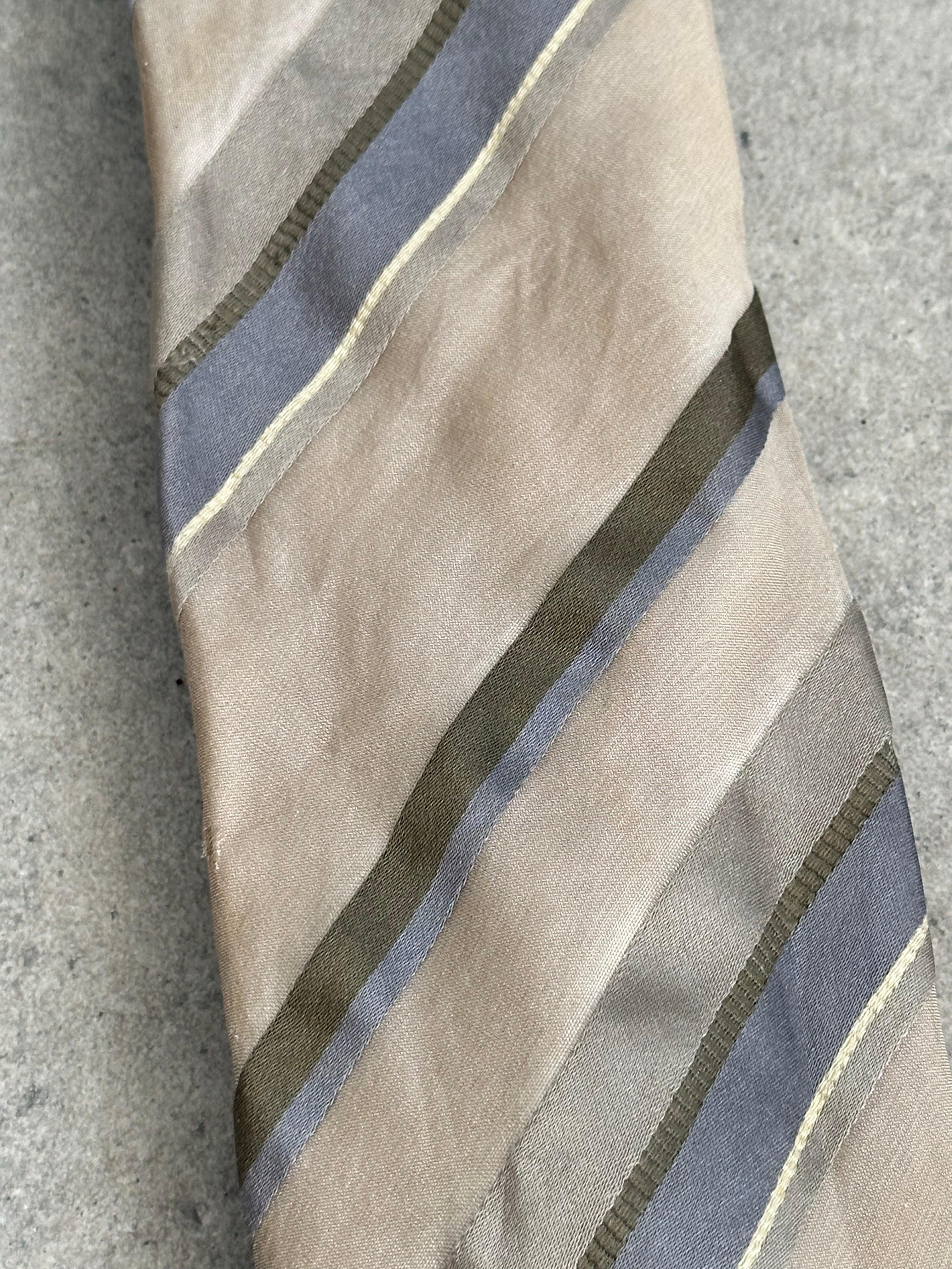 Japanese vintage 1990s pure silk striped tie with classic pattern, featuring bold navy and red stripes on a smooth silk fabric.
