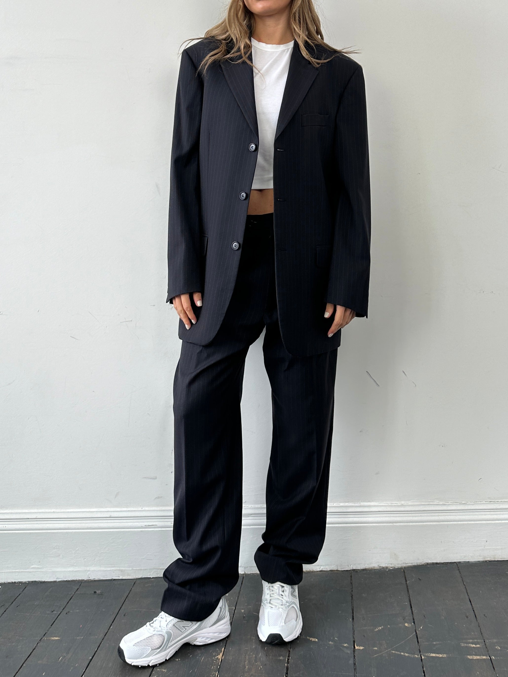 Balmain Pierre Balmain pinstripe pure wool single-breasted jumpsuit in size 40L/W32, shown from front view.