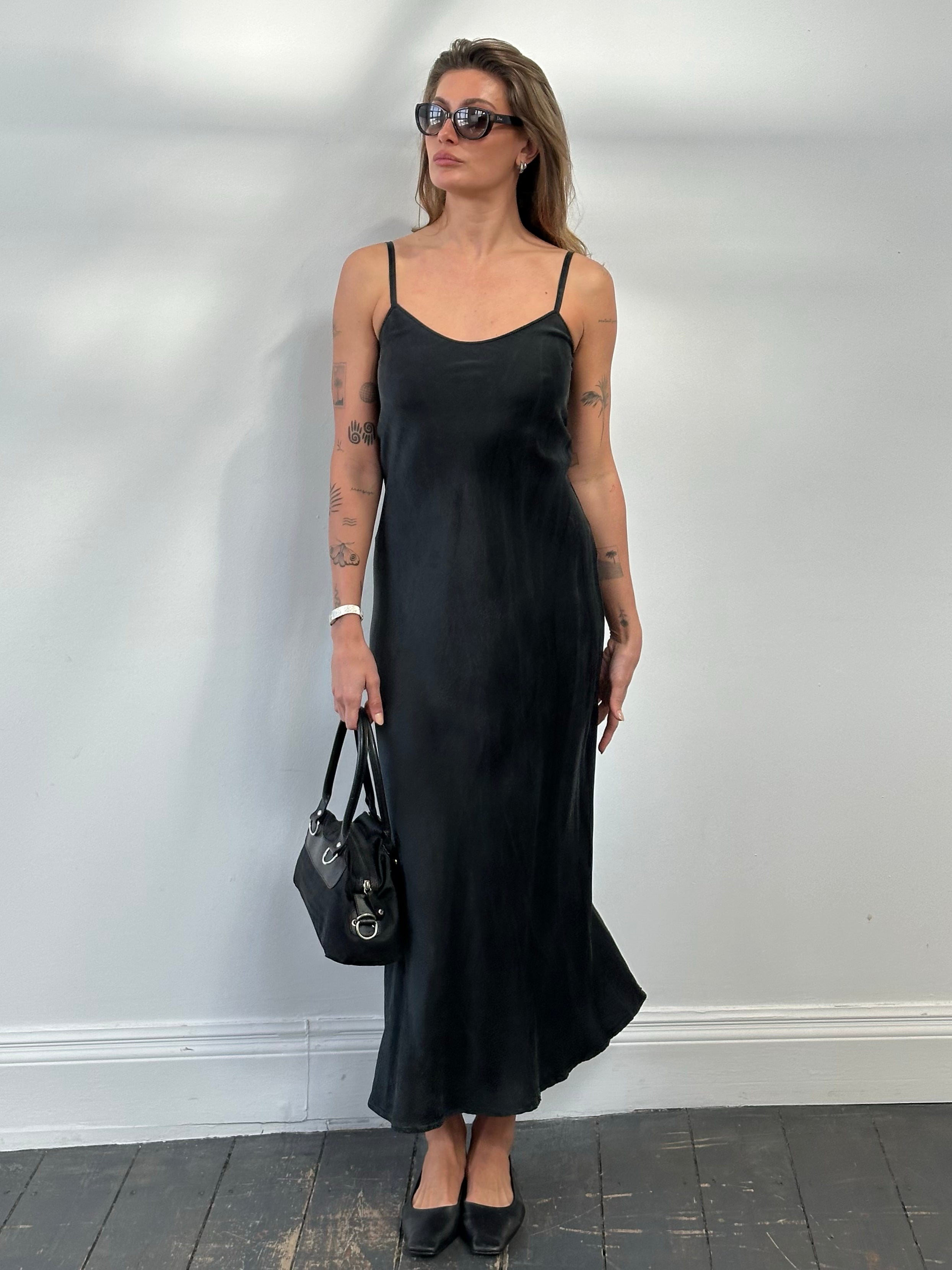 Vintage 1990s pure silk floor-length slip dress, size small, with elegant drape and vintage-inspired design.