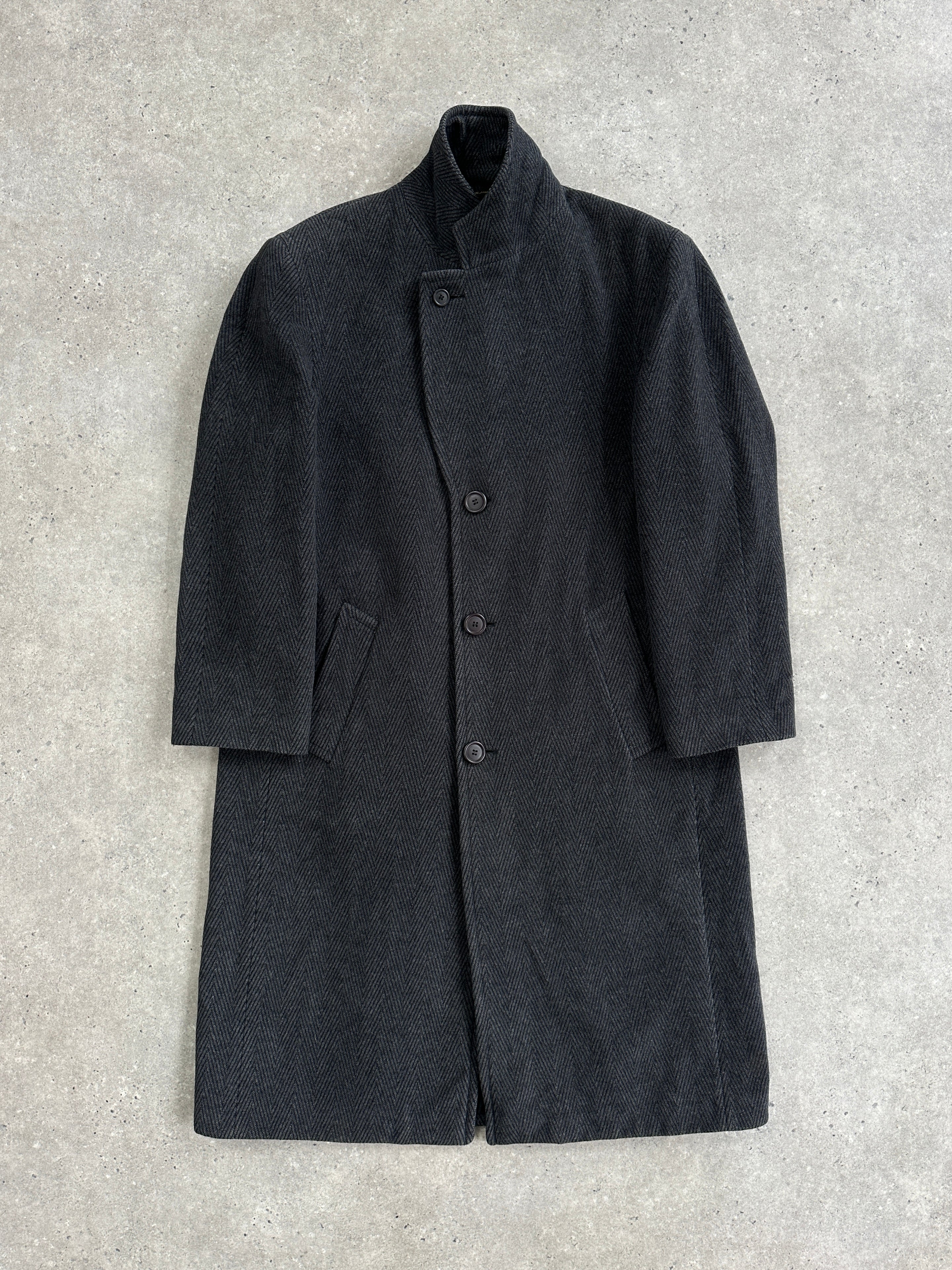 Vintage Italian 1980s wool and cashmere herringbone coat in XL size, featuring classic tailored design and textured fabric.