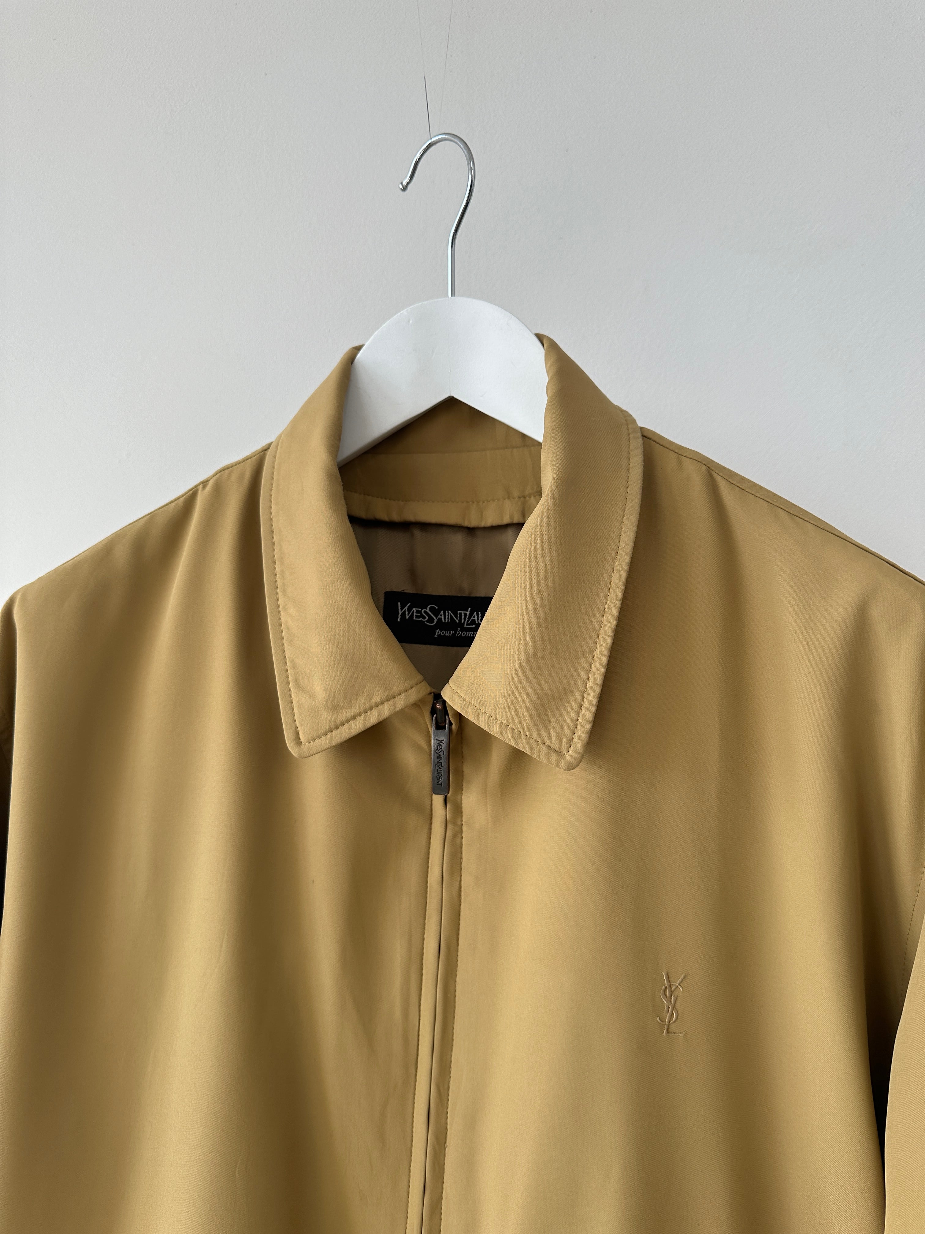 Yves Saint Laurent Pour Homme padded logo bomber jacket in size L/XL, black with embroidered YSL logo on front.