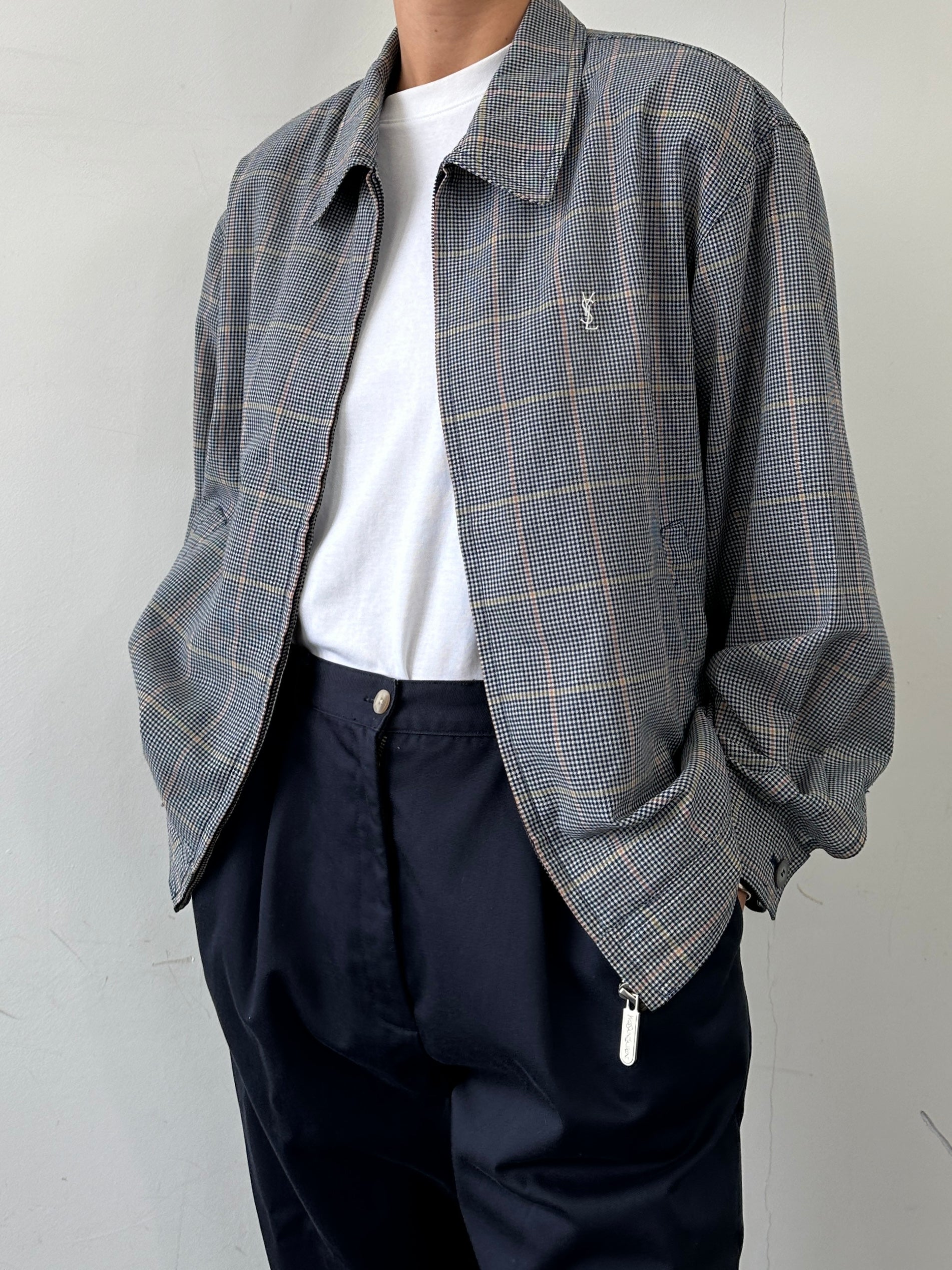 Yves Saint Laurent Pour Homme check logo bomber jacket in size L, featuring a stylish design and classic bomber silhouette.