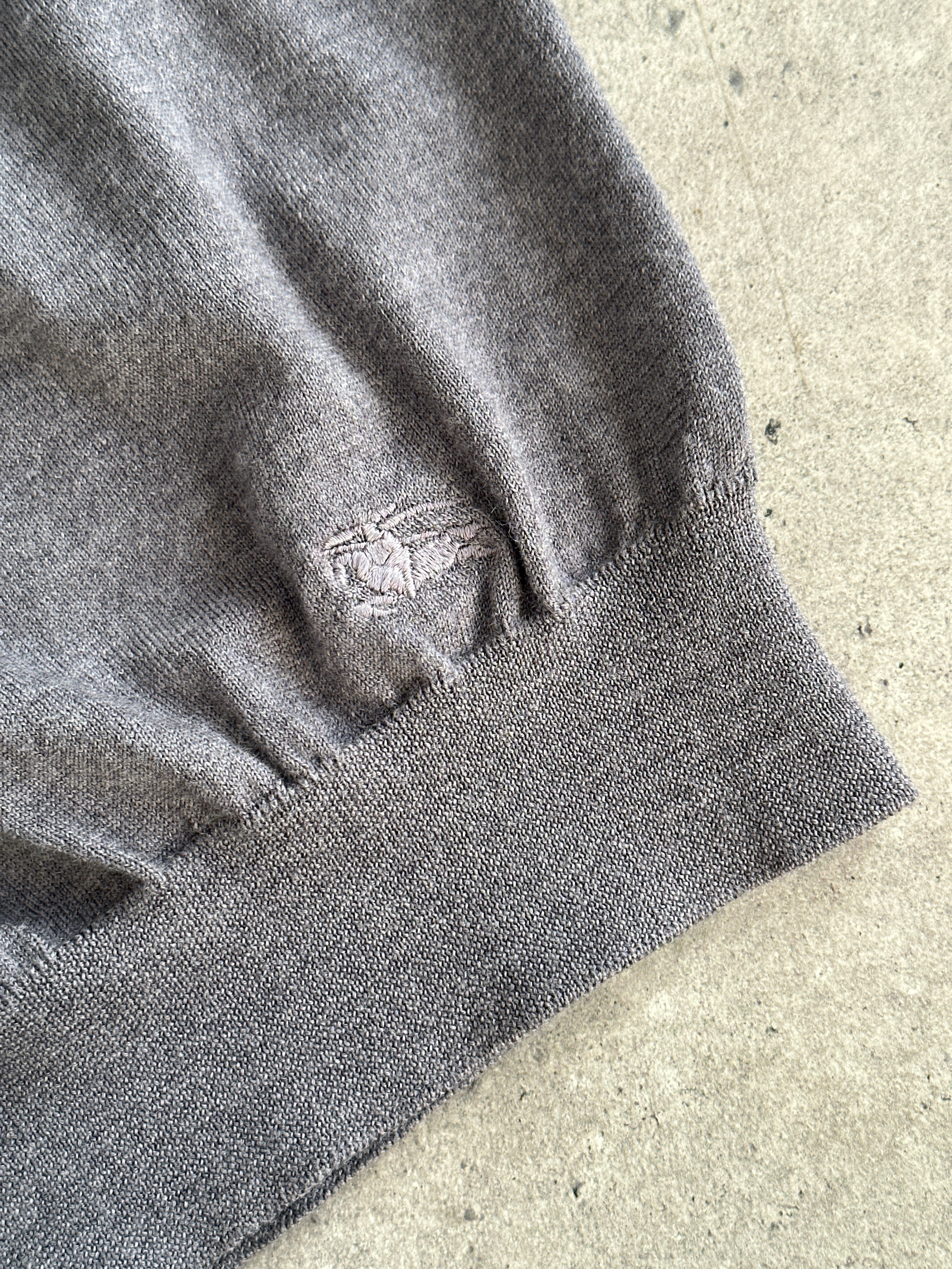 Burberry London 2000s pure merino wool logo knitted jumper in size M, featuring classic design and ribbed cuffs.