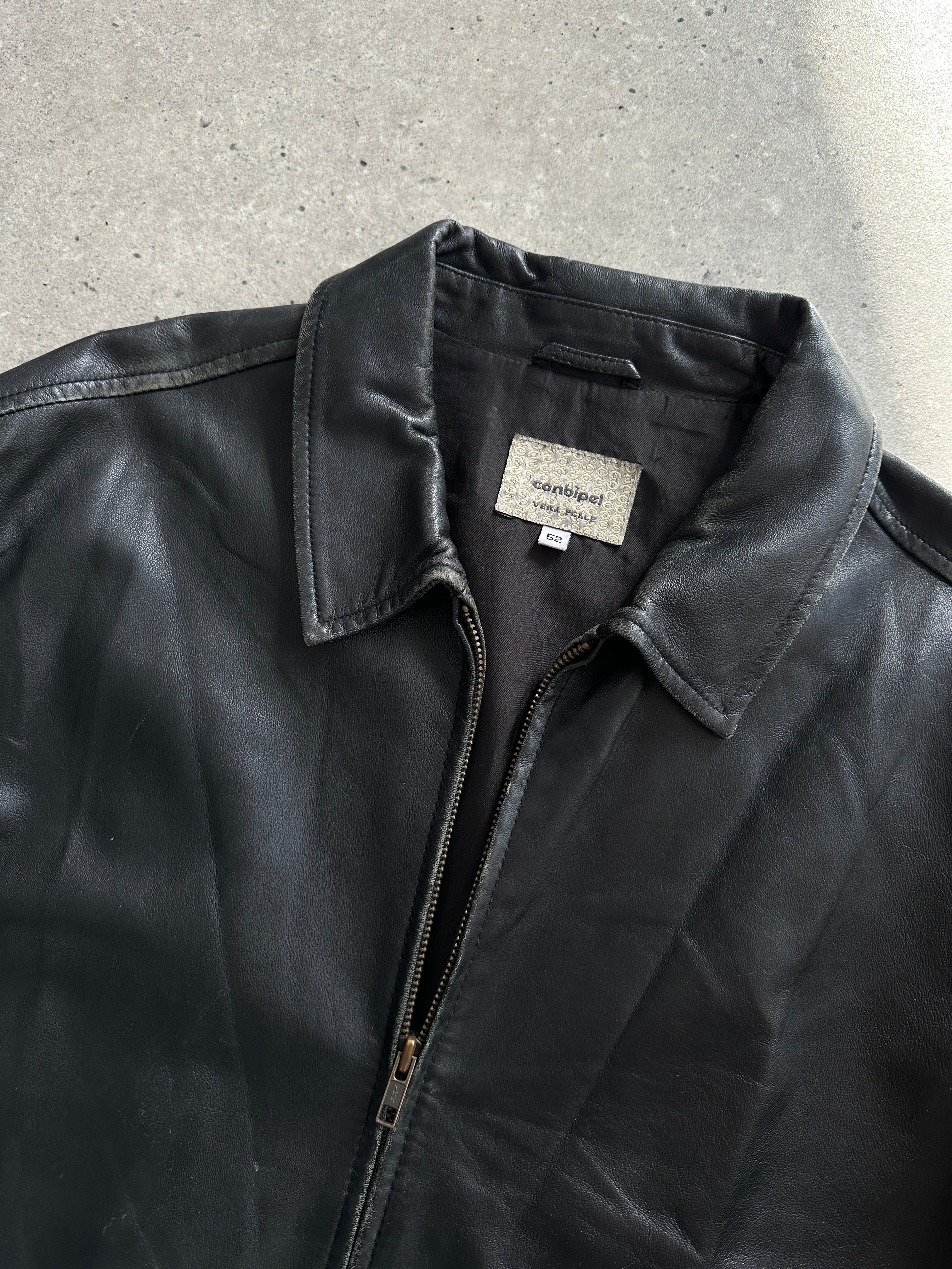 Conbipel minimal leather jacket in size L with sleek design, black leather material, and stylish collar, displayed on a mannequin.