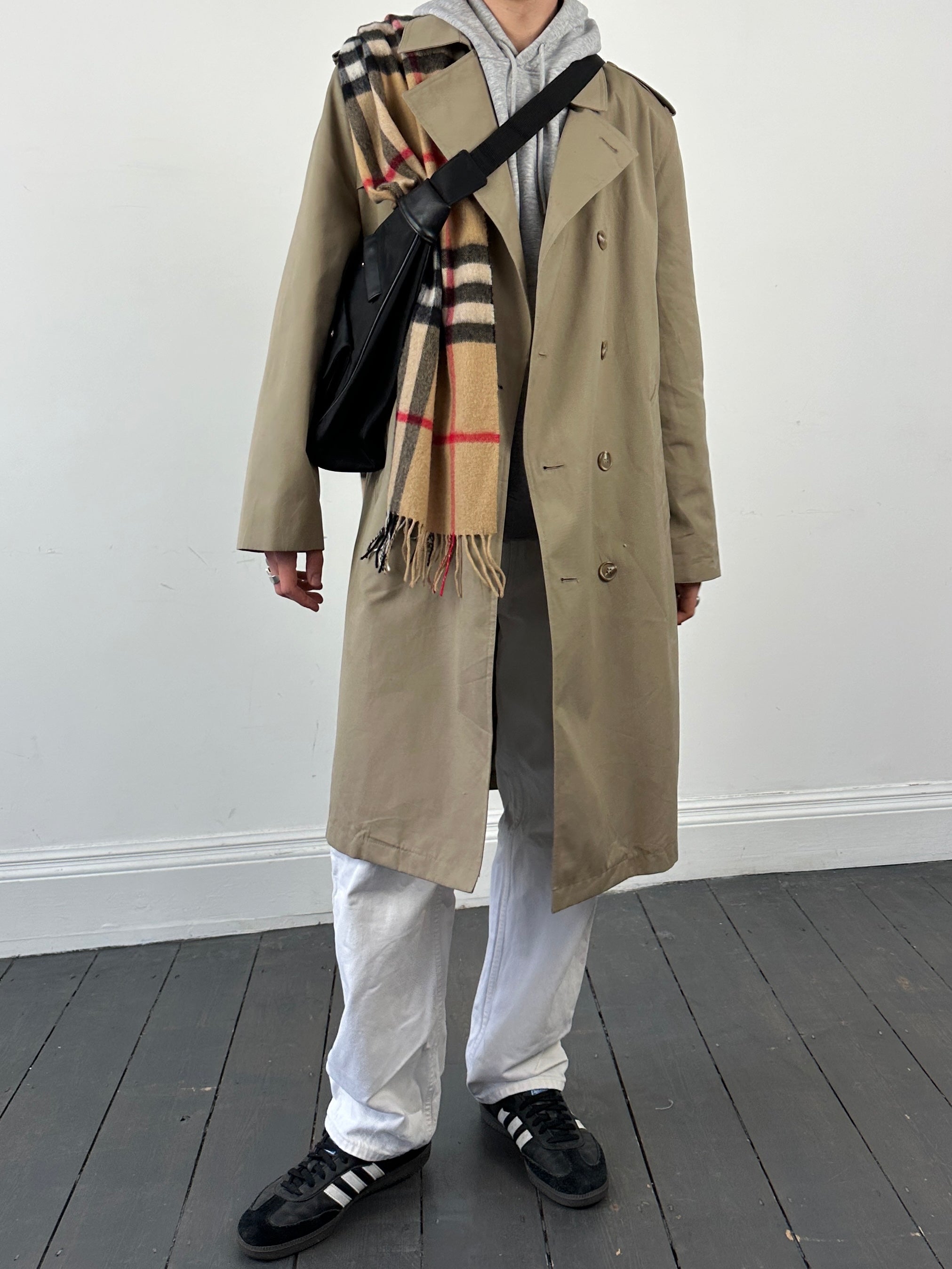 Vintage double-breasted fleece-lined trench coat in XL size, featuring classic design and tailored style.