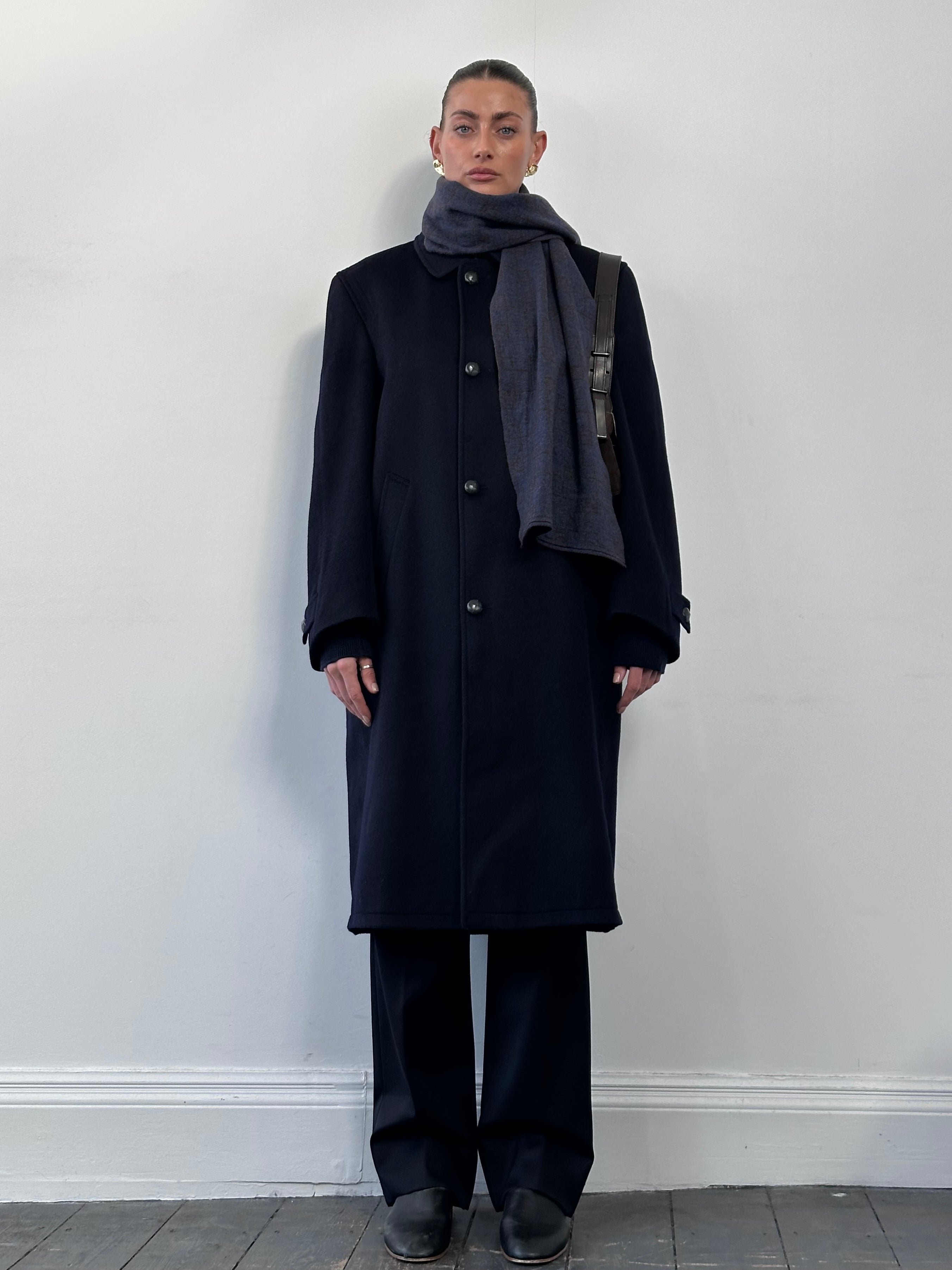 Vintage wool alpaca single-breasted coat in size L, displaying classic design and textured fabric on a neutral background.