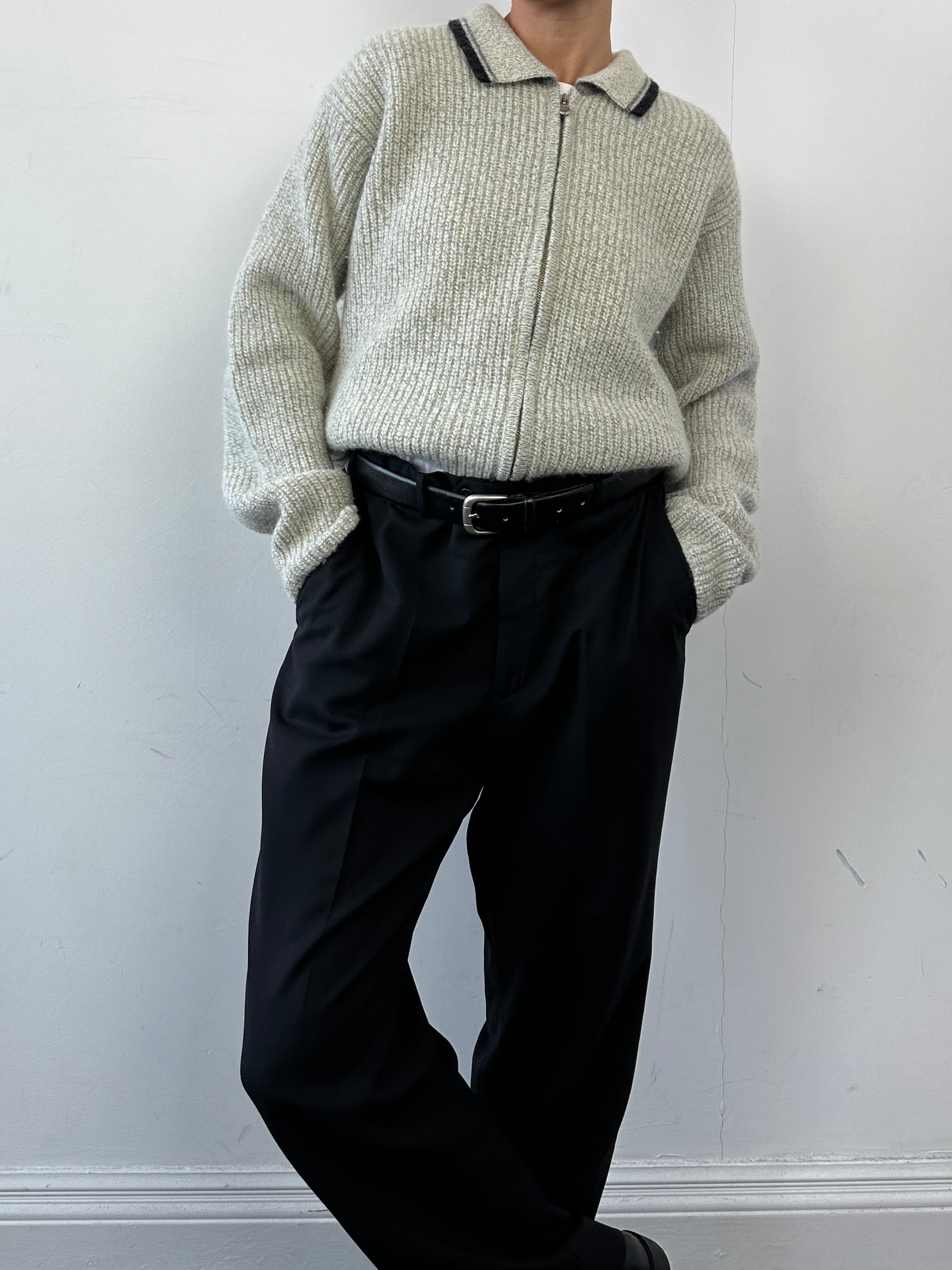 Levi’s wool zip-up knitted cardigan in size L, featuring a cozy knit texture and a front zipper, in neutral color.