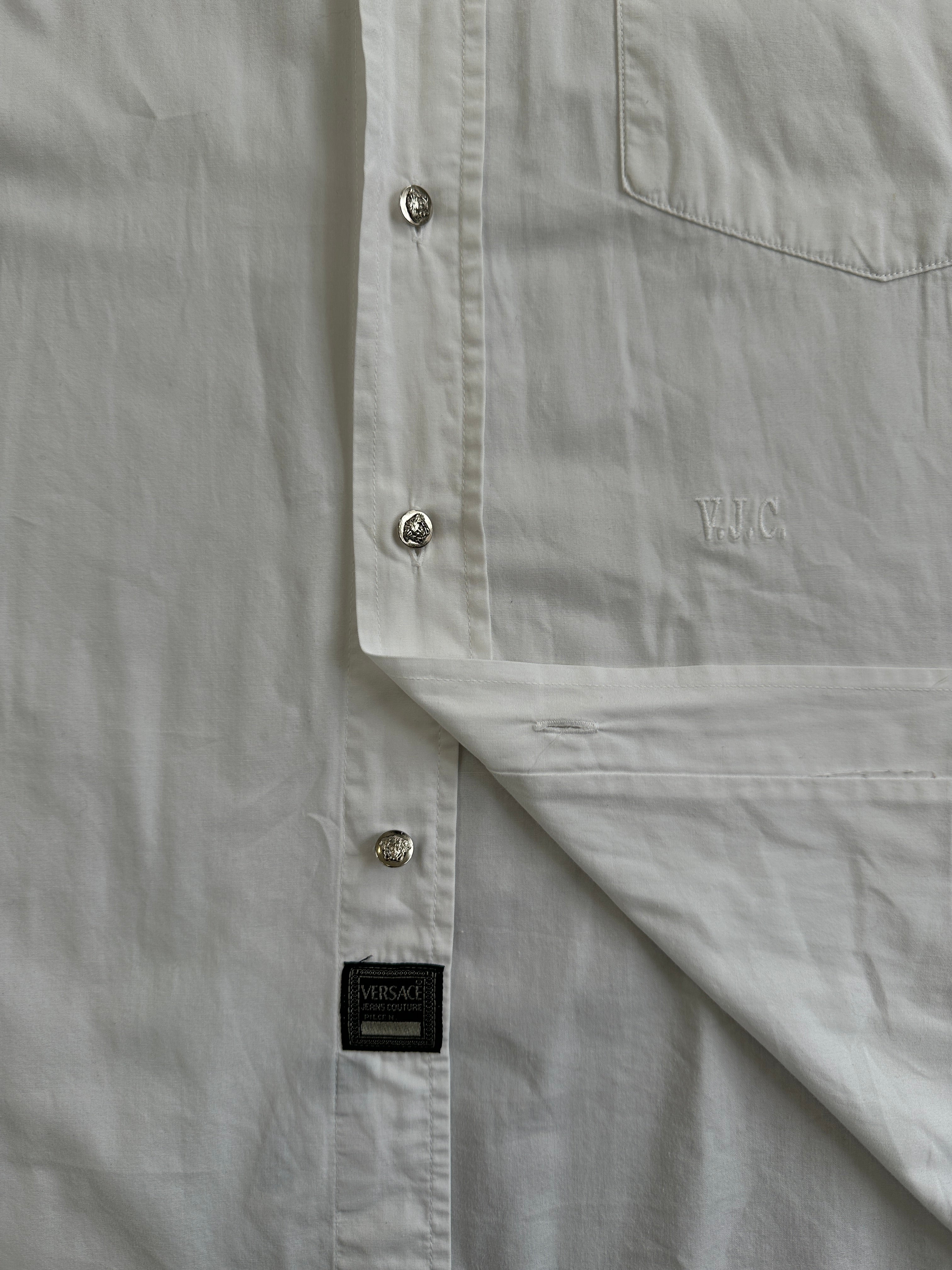 Versace Jeans Couture pure cotton logo shirt in XL, featuring a stylish design and branding, displayed on a hanger.