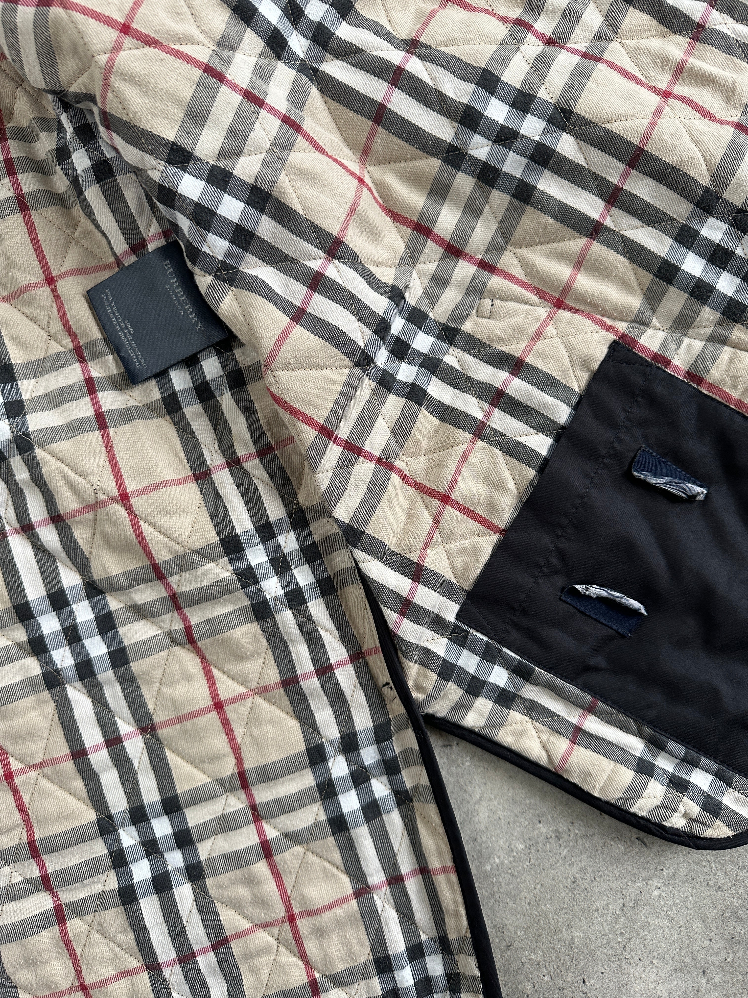 Burberry London 2000s quilted nylon single-breasted coat in size L, featuring classic design and beige color.