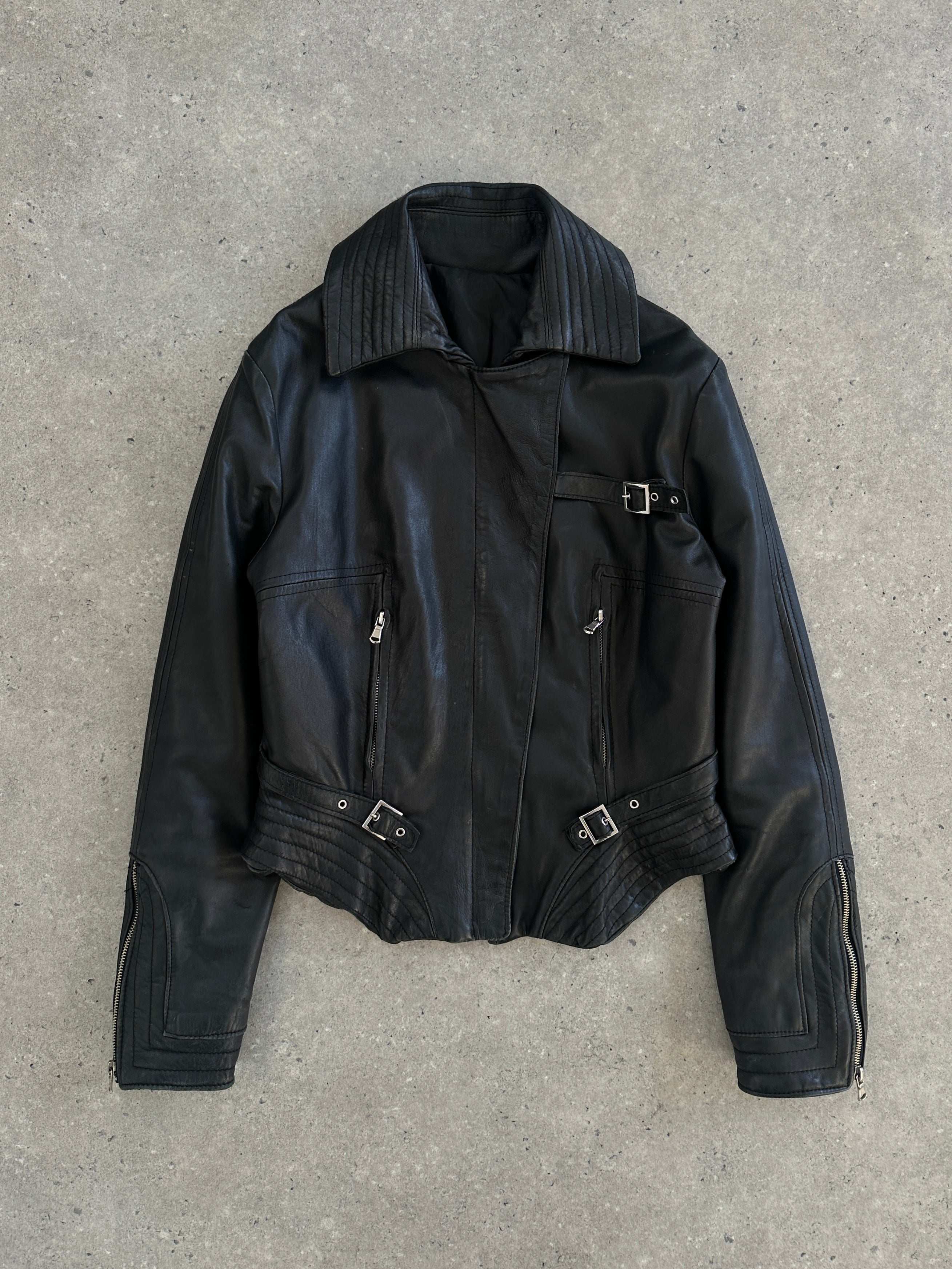 Vintage Italian 1990s fitted leather jacket with buckle details, in size small, showcasing classic retro design and rich leather texture.