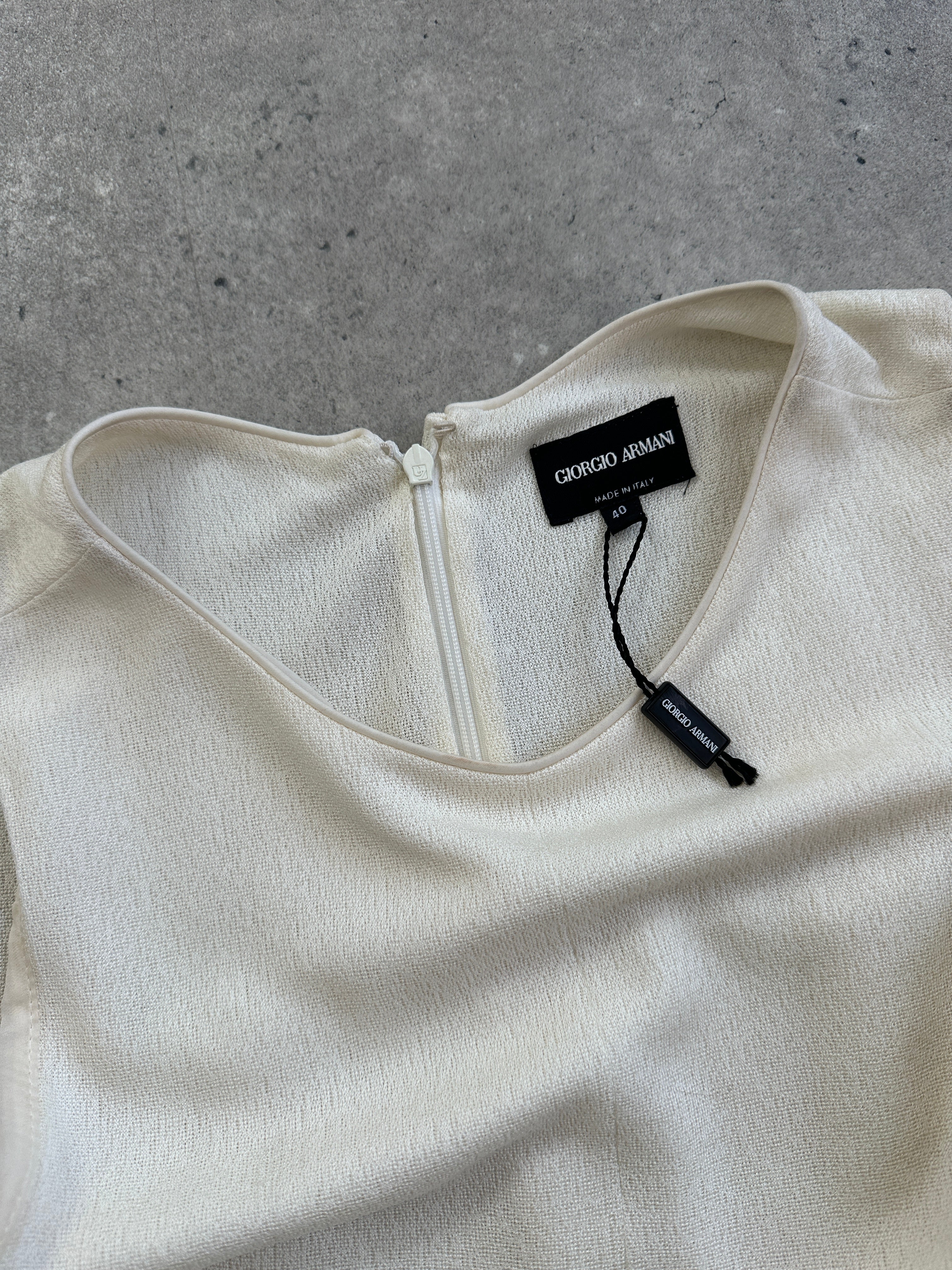 Giorgio Armani 2015 double-layered playsuit in size small, featuring a stylish, layered design and sleek fabric.